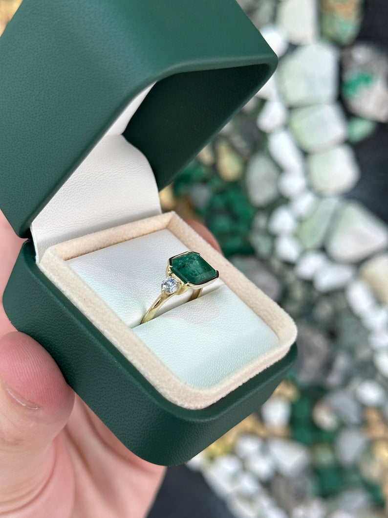 Radiant 14K Gold Diamond Ring Featuring Green Emerald and Brilliant Round Diamonds