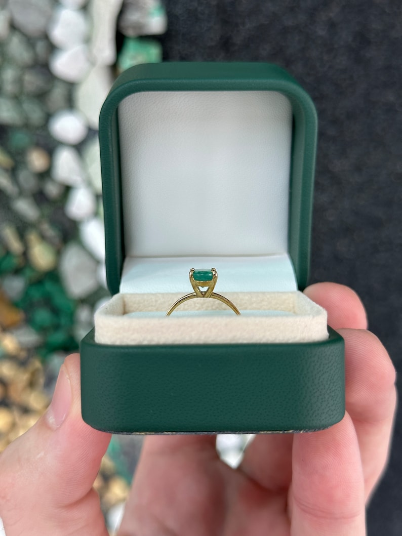 Celebrate Love: Dainty 1.30ct Lush Green Oval Cut Emerald Solitaire in Elegant 14K Gold Setting