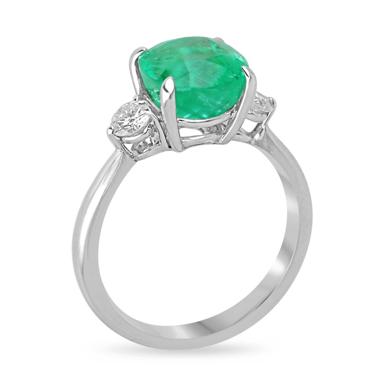 Exquisite 14K White Gold Engagement Ring Featuring a 4.10tcw Vivid Cushion Cut Emerald and Brilliant Round Diamonds