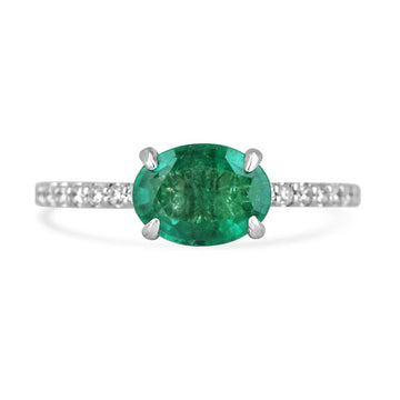 14K Gold Engagement Rings Featuring a Vibrant Oval Emerald and Shimmering Round Diamonds