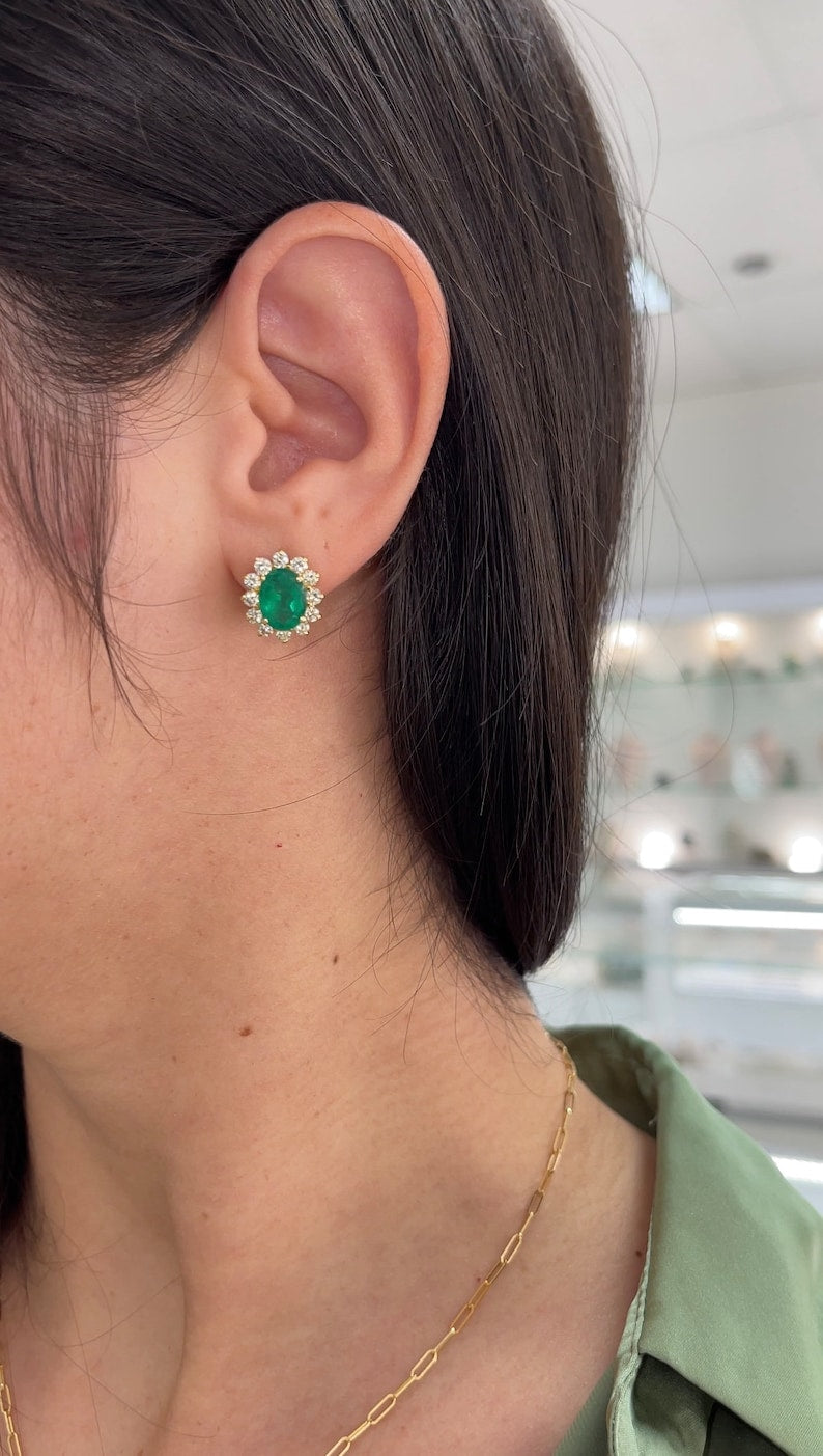 Elegant 18K Gold Earrings Featuring Rich Green Oval Emeralds, 6.60 Carats Total