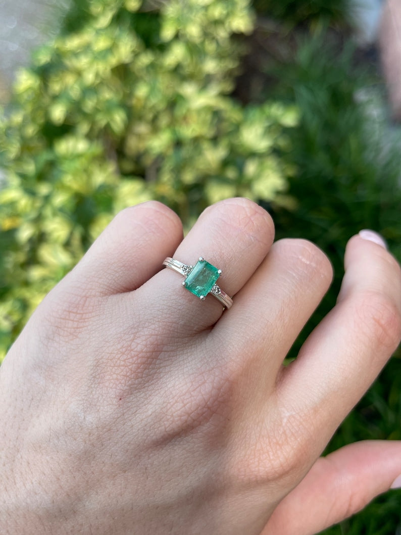 Stunning Three-Stone Ring Crafted in Sterling Silver, Showcasing 1.92tcw Brilliant Round Emerald Cut Diamonds