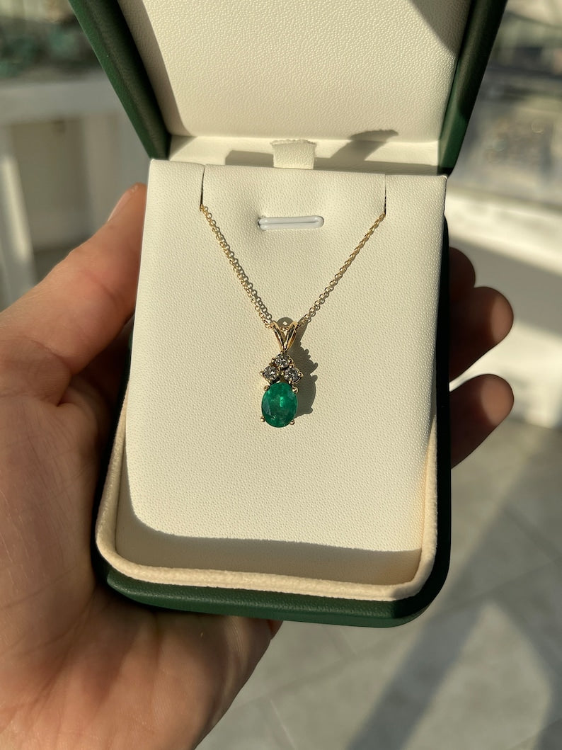 Natural Dark Green Oval Cut Emerald Pendant Necklace with 14K Split Bail and Diamond Accent totaling 2.27 Carats