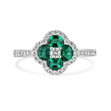 White Gold Ring with 0.95 Total Carat Weight Oval Cut Emerald and Diamond Halo