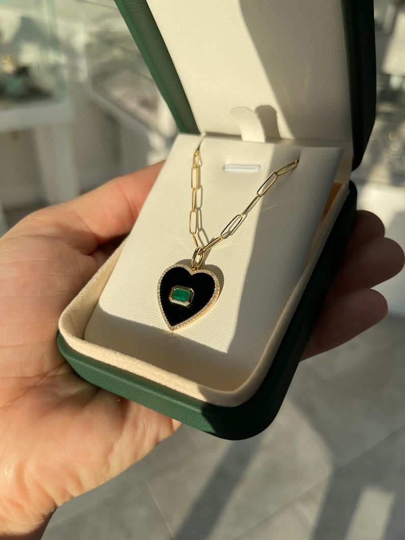 Luxurious 0.90tcw Natural Emerald Cut Pendant in 14K Gold, Set East to West in Onyx Black with Brilliant Diamond Heart Halo