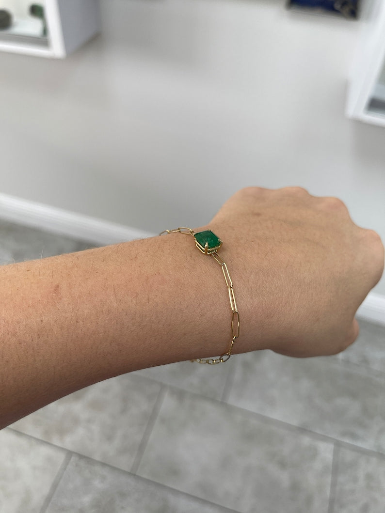 Paperclip Style 14K Bracelet Showcasing a 2.68 Carat Natural Emerald Cut Gem in a Stunning Dark Green with East to West Prong Setting
