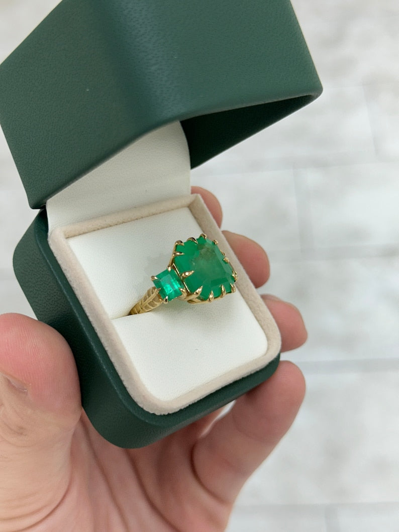 13.73tcw 18K Gold 750 Vivid Medium Green Emerald 3 Stone Trilogy Multi-Prong Ring
