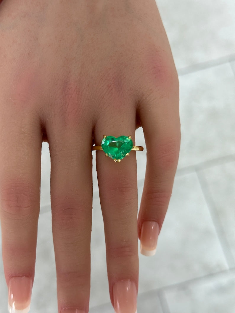 Eye-catching 18K Gold Solitaire Statement Ring with 4.53ct Heart-Cut Electric Emerald