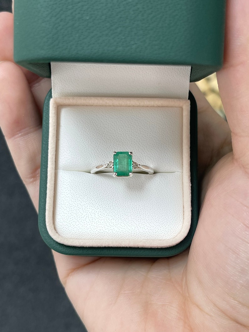 1.50 Carat Total Weight Sterling Silver Ring: Vibrant Emerald Cut Green Stone and Champagne Diamonds