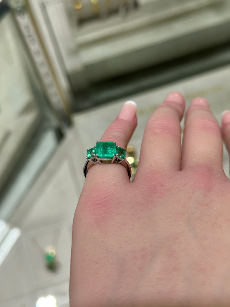 Gorgeous 3.37tcw Asscher Cut Emerald Trilogy Ring in 18K Gold: Ideal for Right Hand Engagement