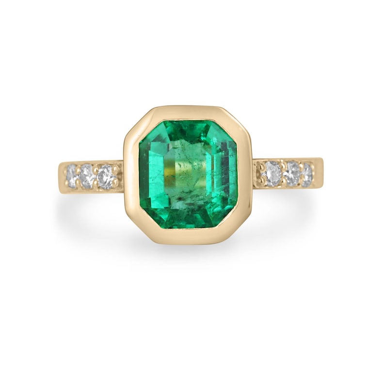 Exquisite 18K Gold Engagement Ring with 2.47tcw Emerald Cut Diamond Accent