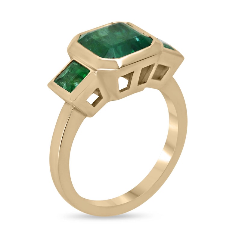 14K Gold Emerald Ring with 4.08tcw Asscher Cut and Stunning Princess Cut Accents