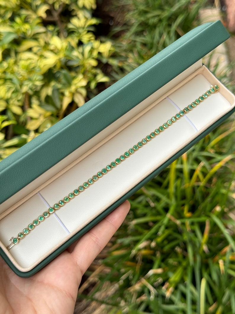 Luxurious 14K Gold Bracelet adorned with Natural Medium Green Emeralds