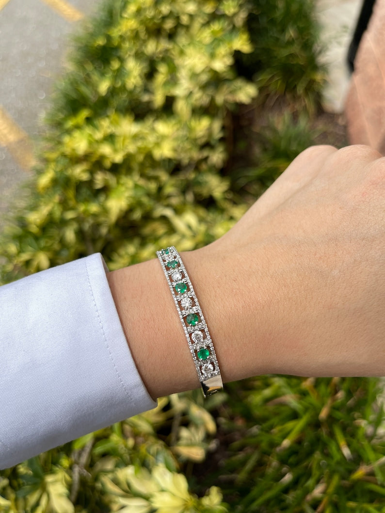 Luxurious 18K White Gold Cuff Bracelet Adorned with 3.50tcw Round Emerald and Diamond Stones