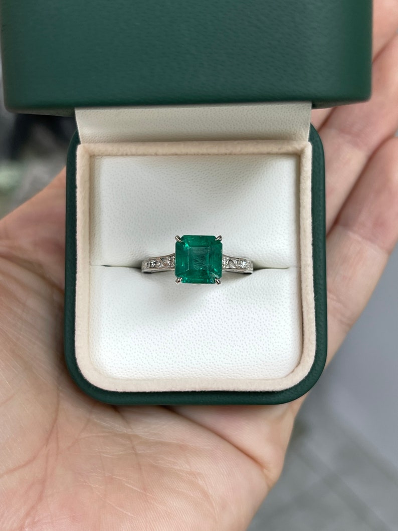 Elegant Engagement Ring with Asscher Cut Emerald (3.57tcw) in a Floral Diamond Setting