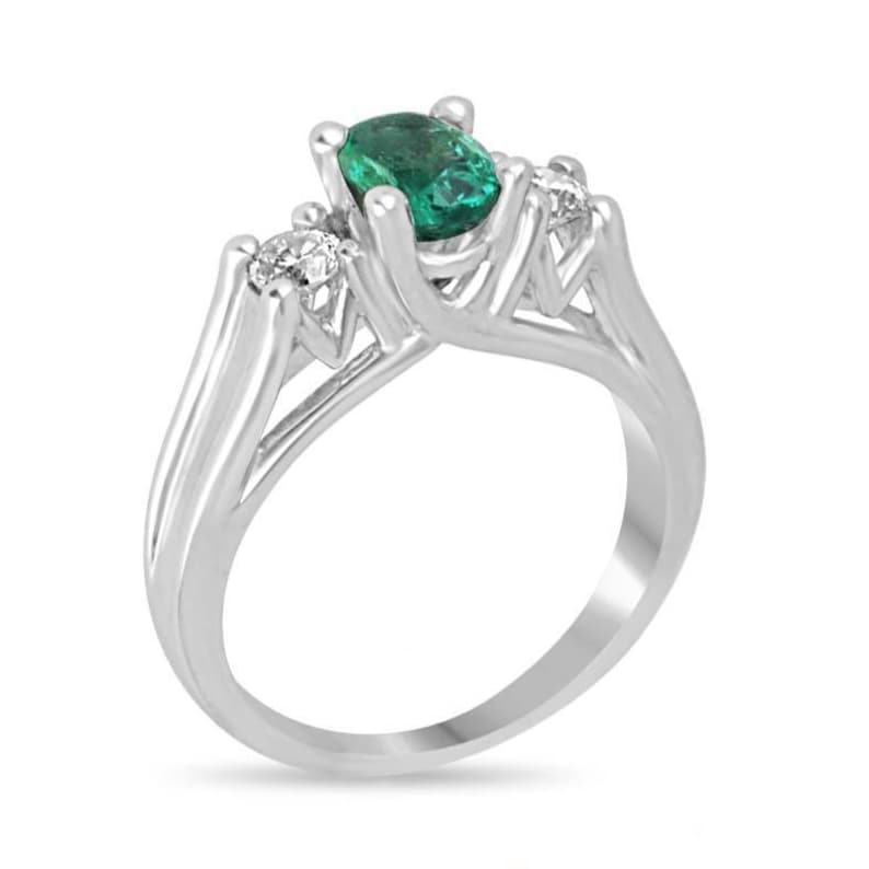 Stunning 1.50tcw Three Stone Right Hand Ring Featuring Oval Emerald and Diamonds in 14K White Gold