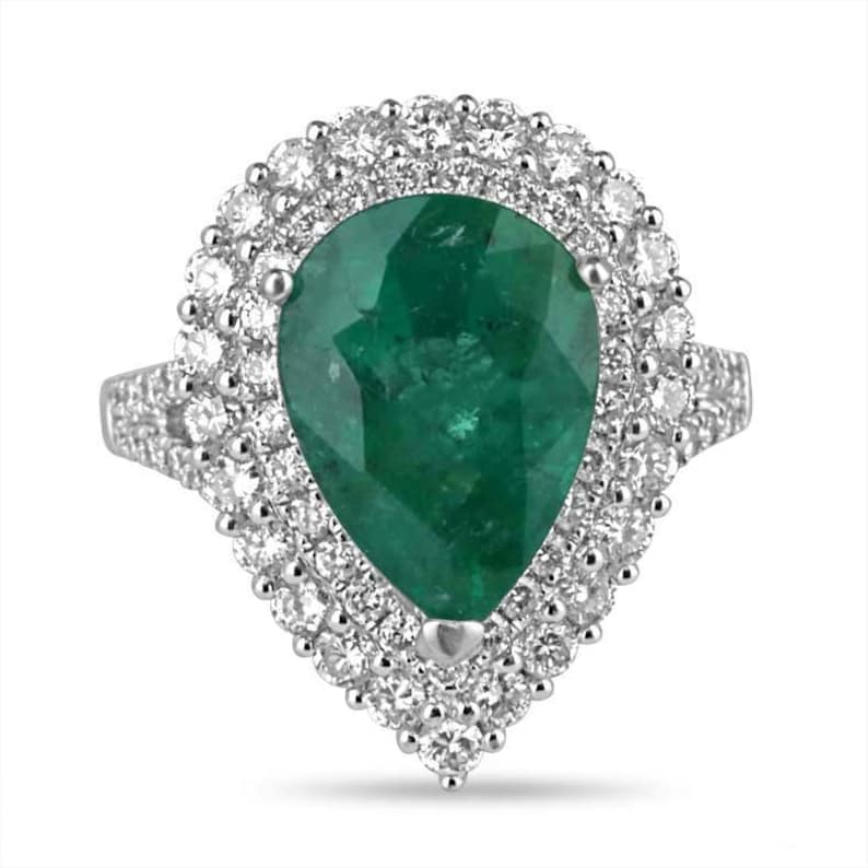 18K Gold Engagement Ring Featuring 8.70tcw Pear Cut Emerald Surrounded by Double Diamond Halo