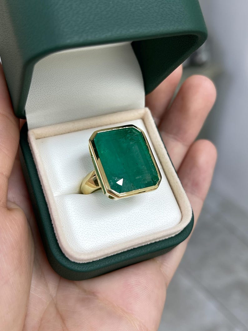 Bold Dark Green 25.25 Carat Emerald Solitaire Ring with 18K Gold Bezel Setting