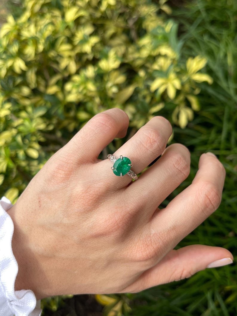 3.11ct Dark Green Oval Emerald in a 14K White Gold Solitaire Setting