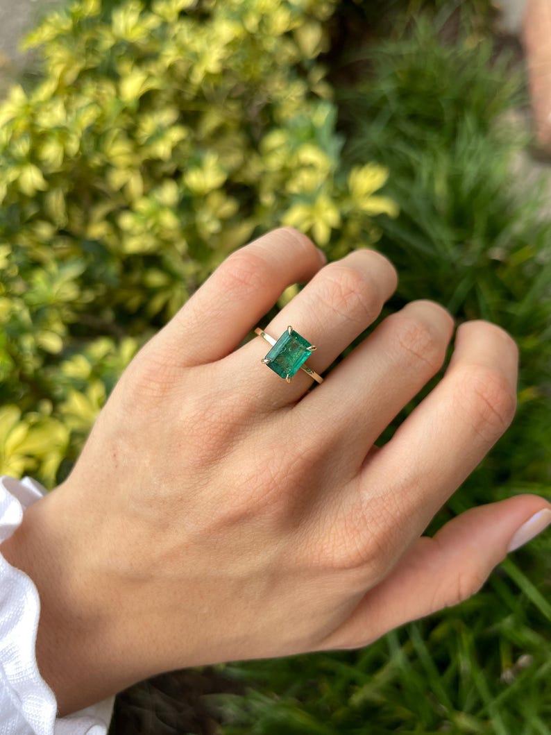 Stunning 14K Gold Three-Stone Ring with 3.30tcw of Natural Emerald and Diamonds