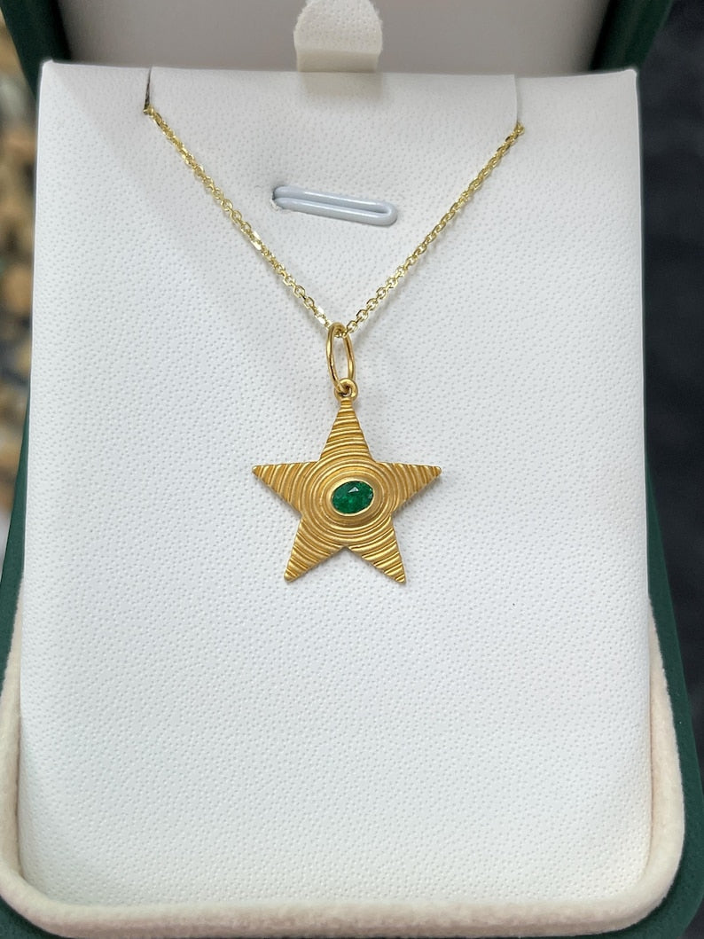 Elegant 14K Gold 0.19ct Emerald Star Pendant with Rippled Bezel