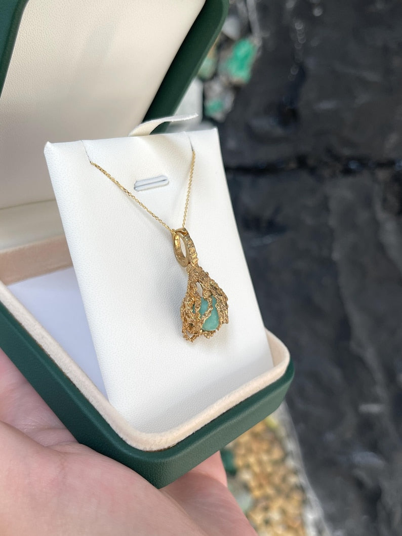 Elegant 6.80-Carat Emerald Cabochon Pendant with 14K Yellow Gold and Floating Nugget Cage