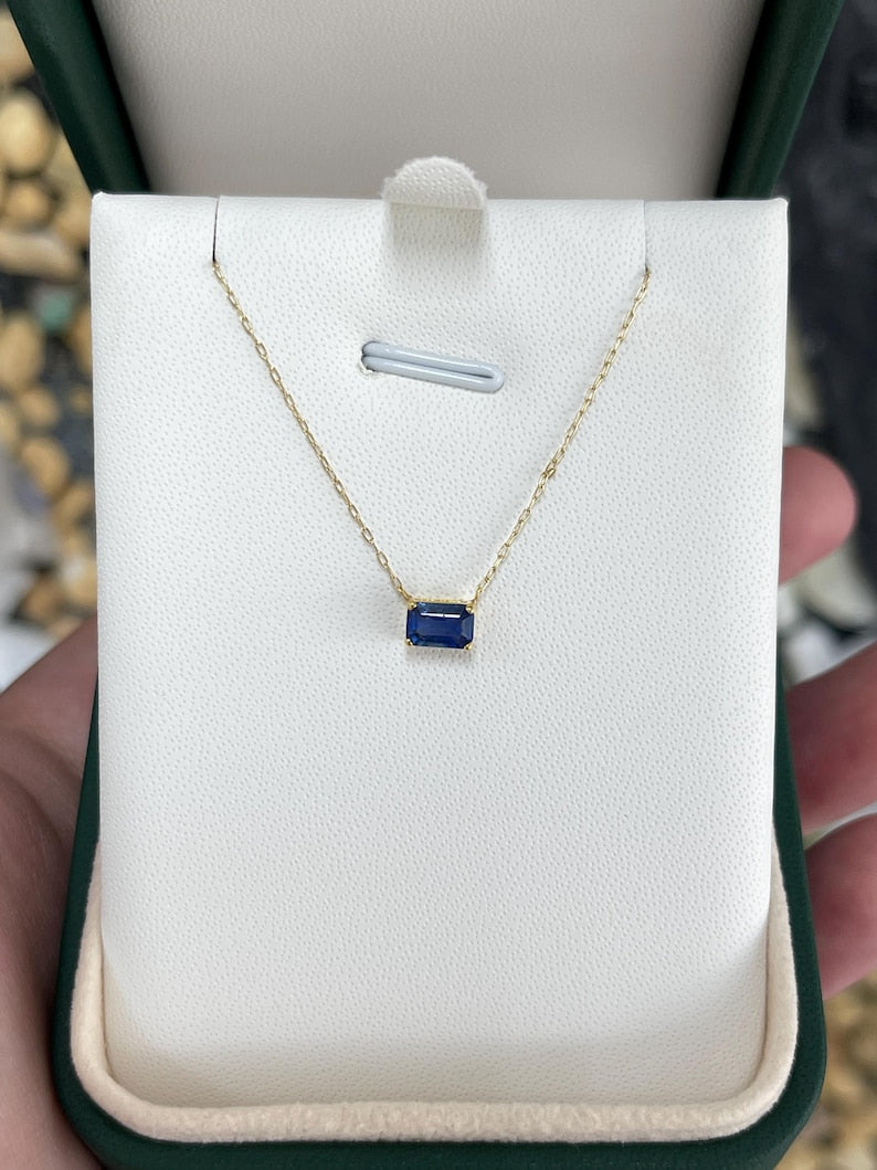 Elegant 14K Gold Blue Sapphire Pendant with 0.65ct Emerald Cut