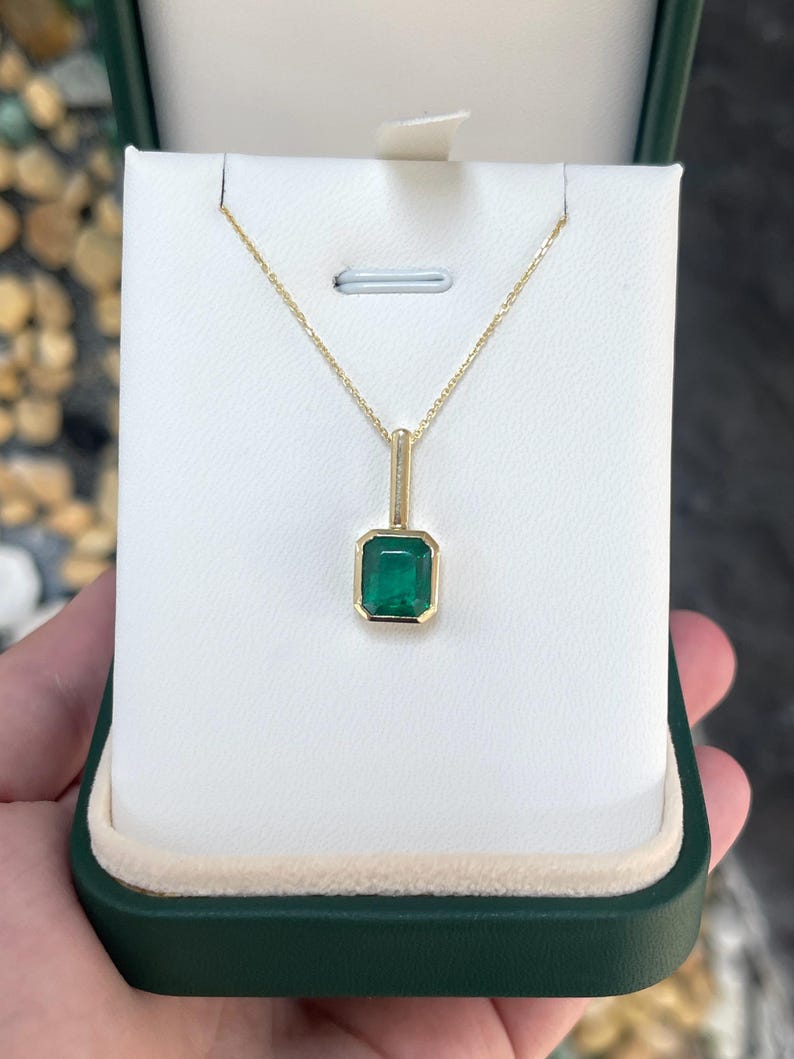 2.58ct Emerald Cut Green Emerald Pendant, North-South Bezel Set, 14K Gold