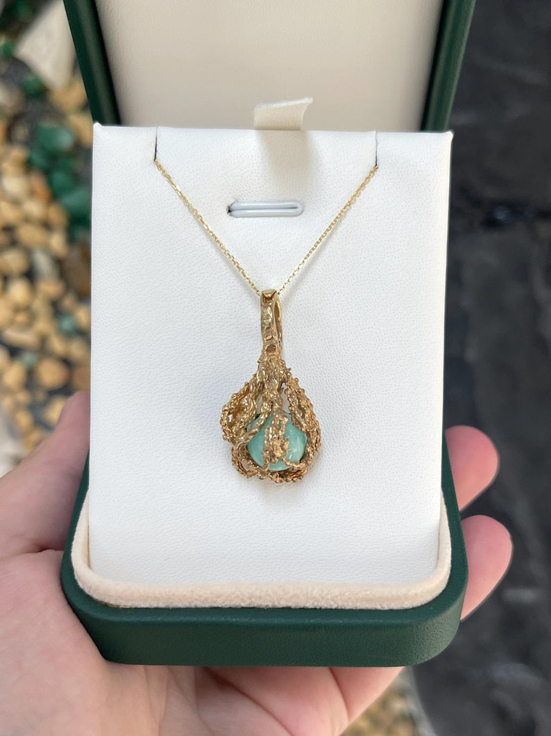 6.80-Carat Earth Mined Emerald Pendant Set in 14K Yellow Gold with Nugget Cage Style