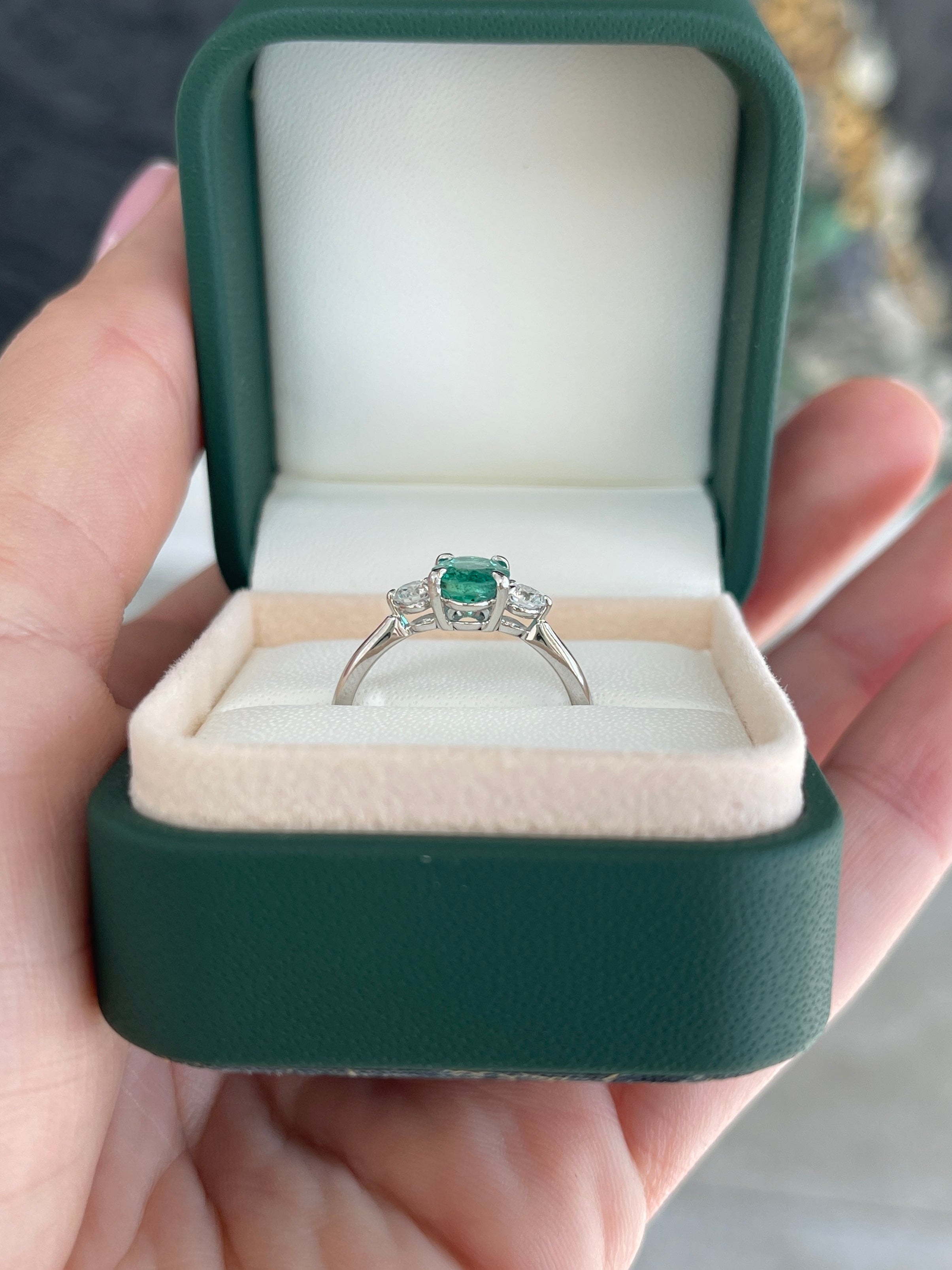 14K natural bluish-green oval cut emerald and round lab diamond three-stone ring by JR Colombian Emeralds, detailed close-up image