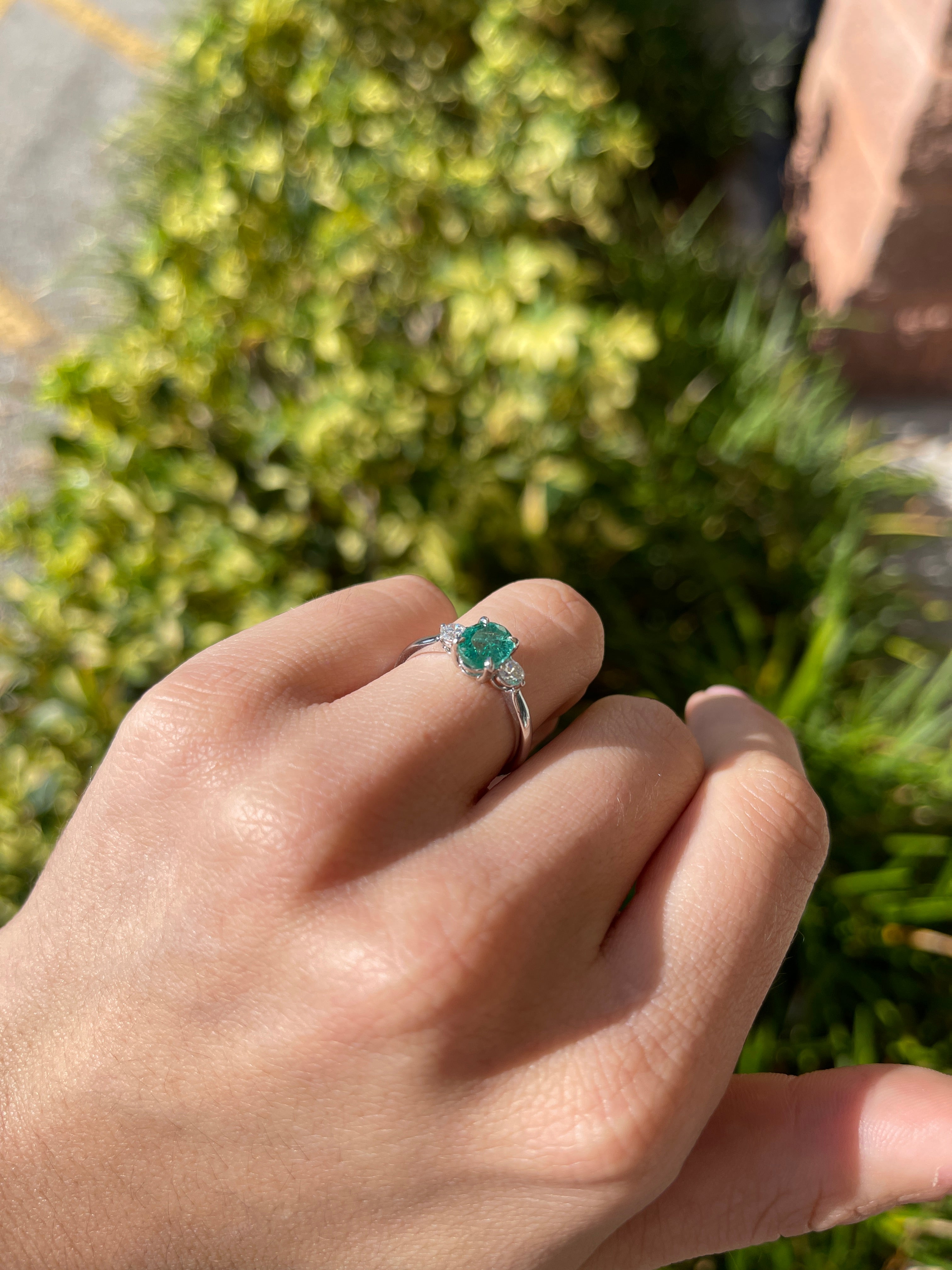14K gold three stone ring with a 1.50tcw oval cut bluish-green emerald and round lab-grown diamonds by JR Colombian Emeralds
