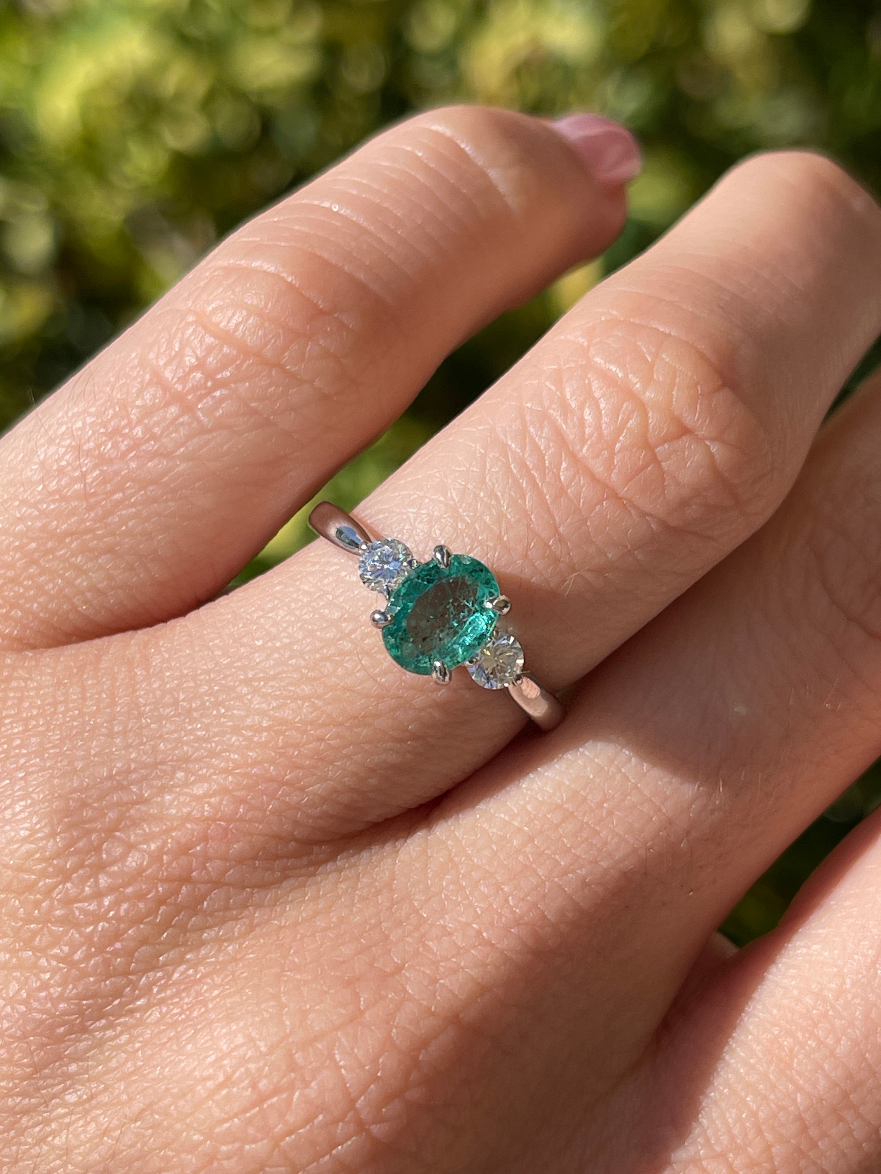 14K gold three-stone ring with 1.50tcw bluish-green oval emerald and round lab diamonds, elegant jewelry by JR Colombian Emeralds