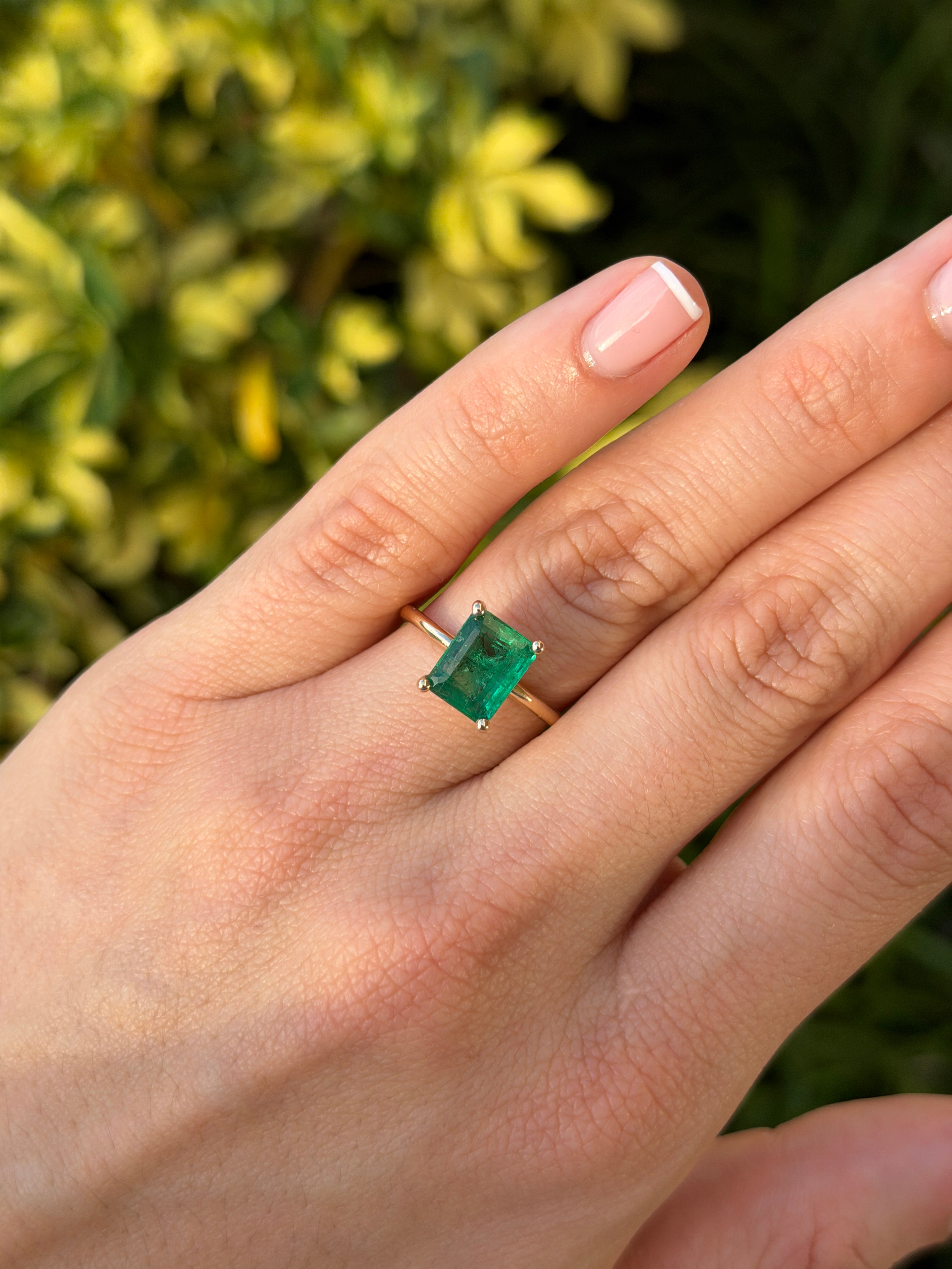 Natural 2.32 carat emerald solitaire ring with four prongs in 14K gold by JR Colombian Emeralds.