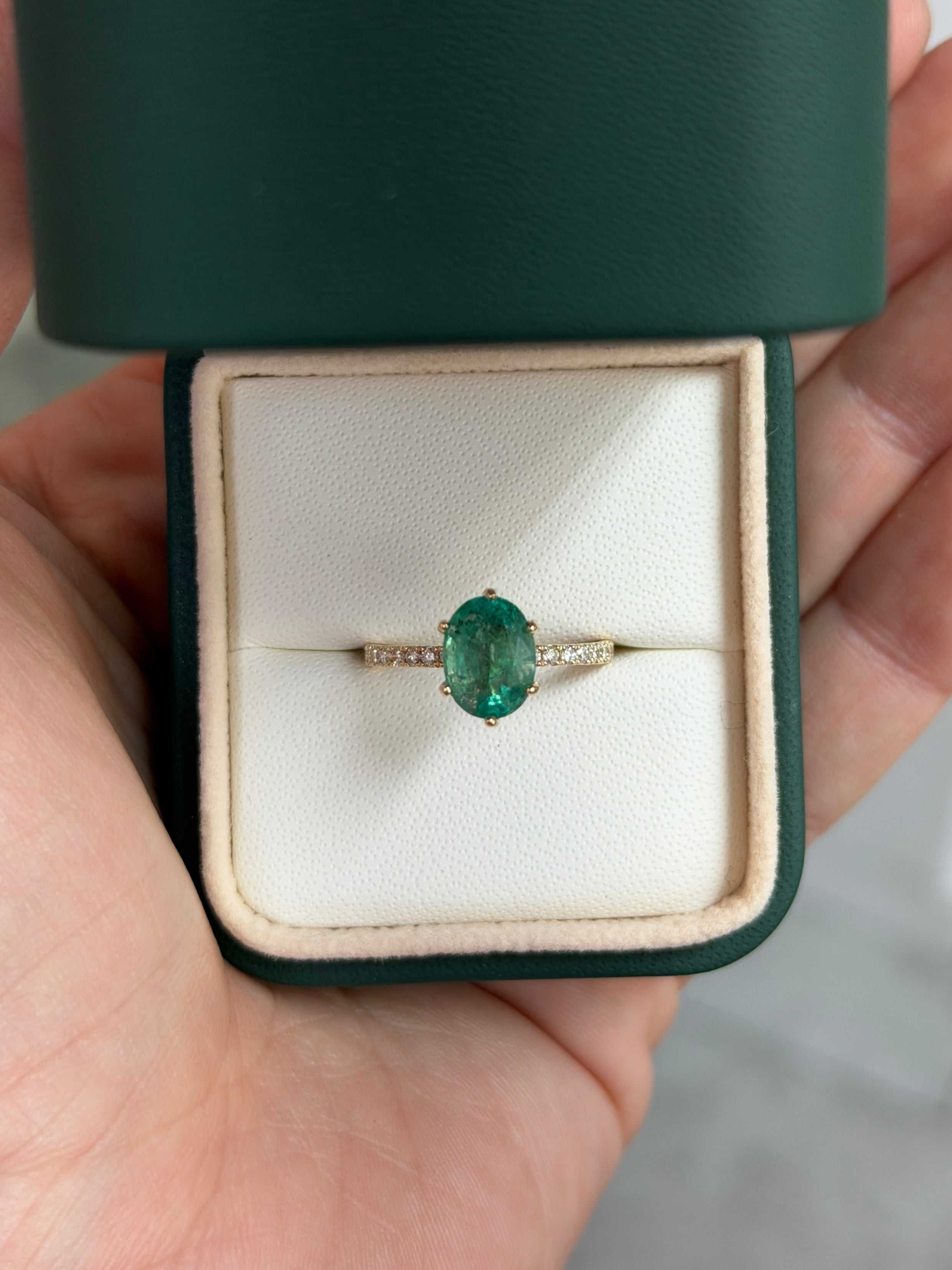 Oval freckled emerald engagement ring with lab diamond accents, 14K gold setting, featuring natural 2.40tcw emerald from JR Colombian Emeralds.