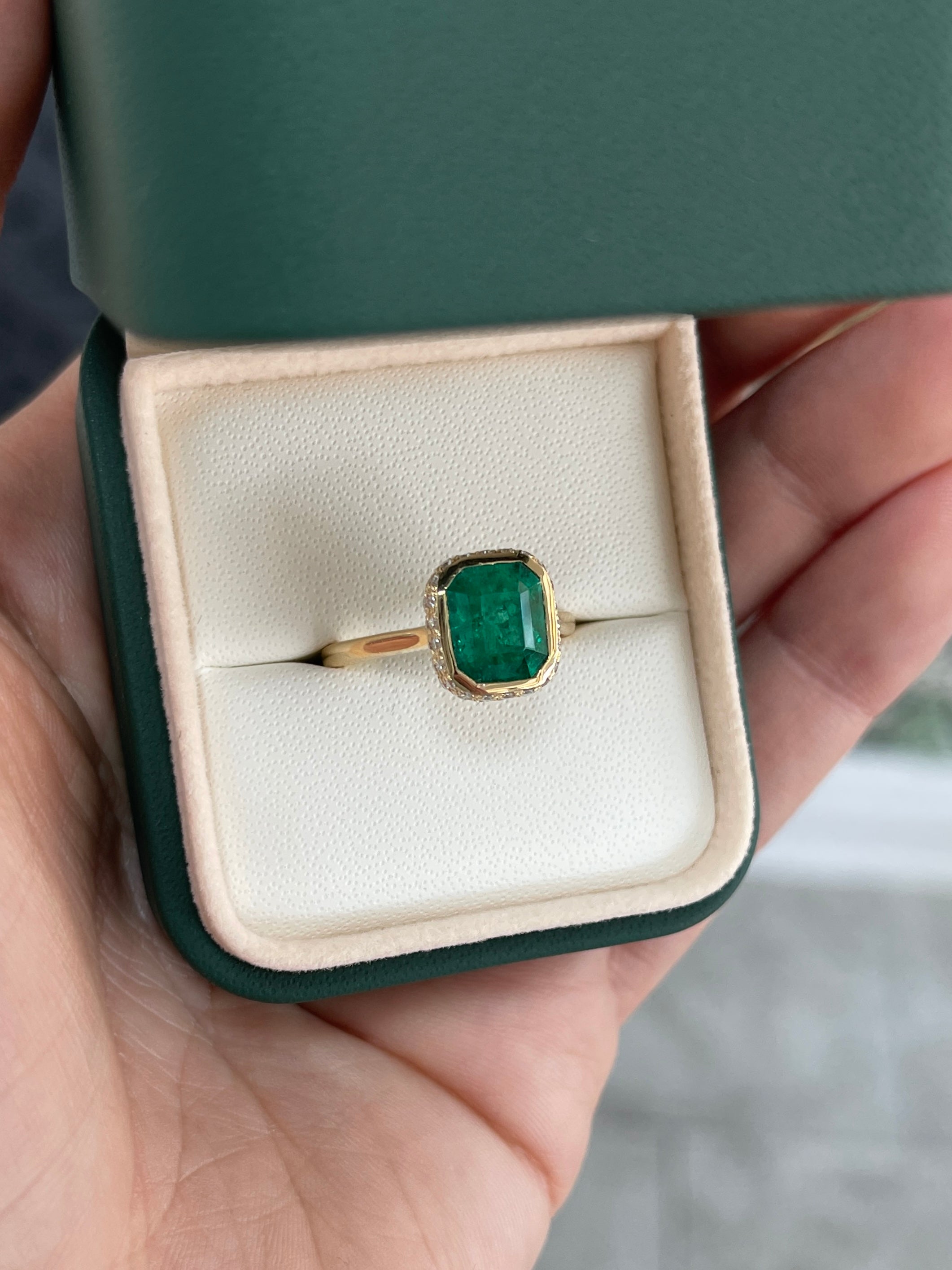 14K Colombian Emerald and diamond pave statement ring with bezel setting and hidden halo from JR Colombian Emeralds.