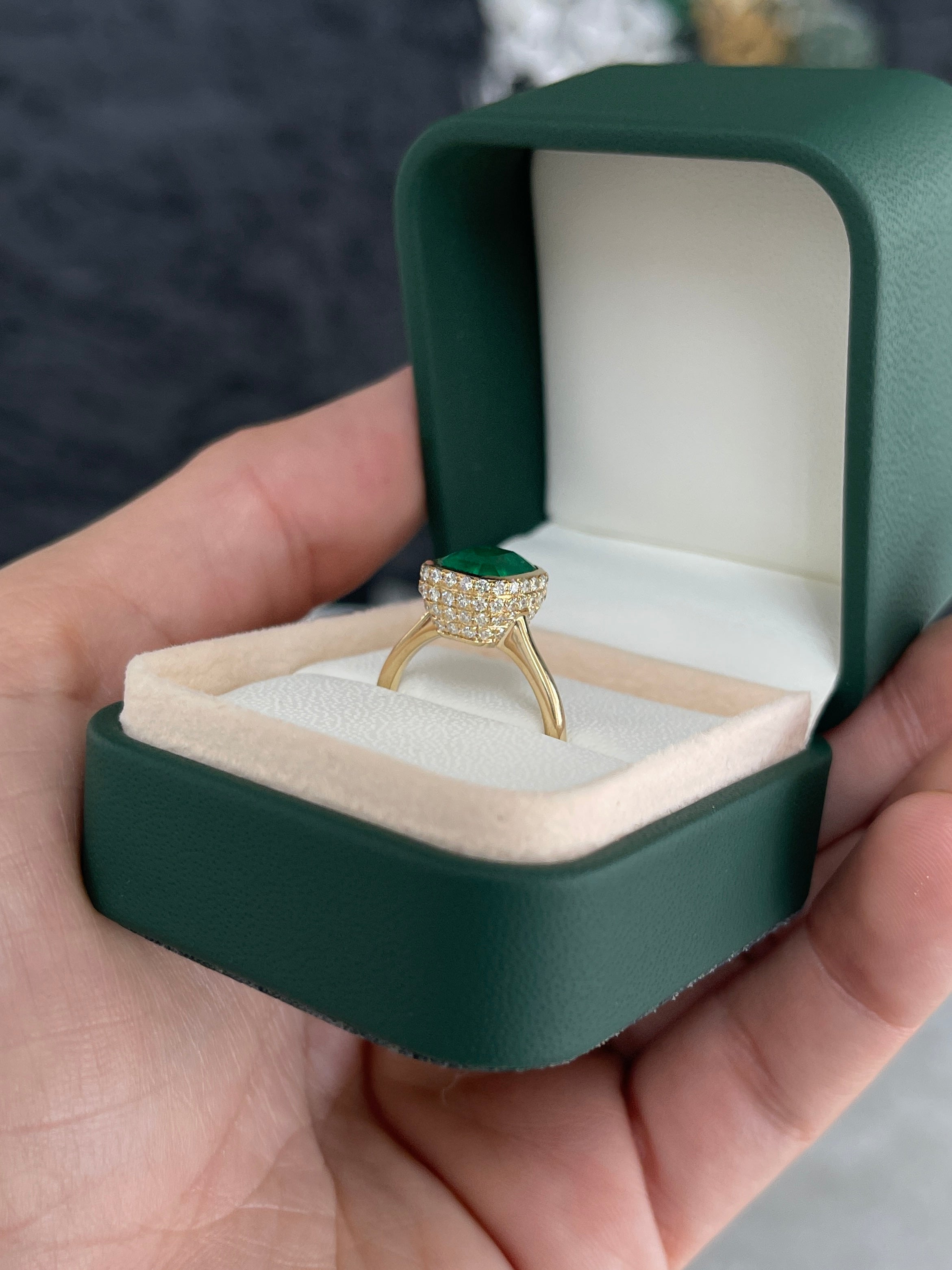 14K Colombian Emerald and diamond pave halo statement ring featuring a 3.19tcw bezel setting by JR Colombian Emeralds.