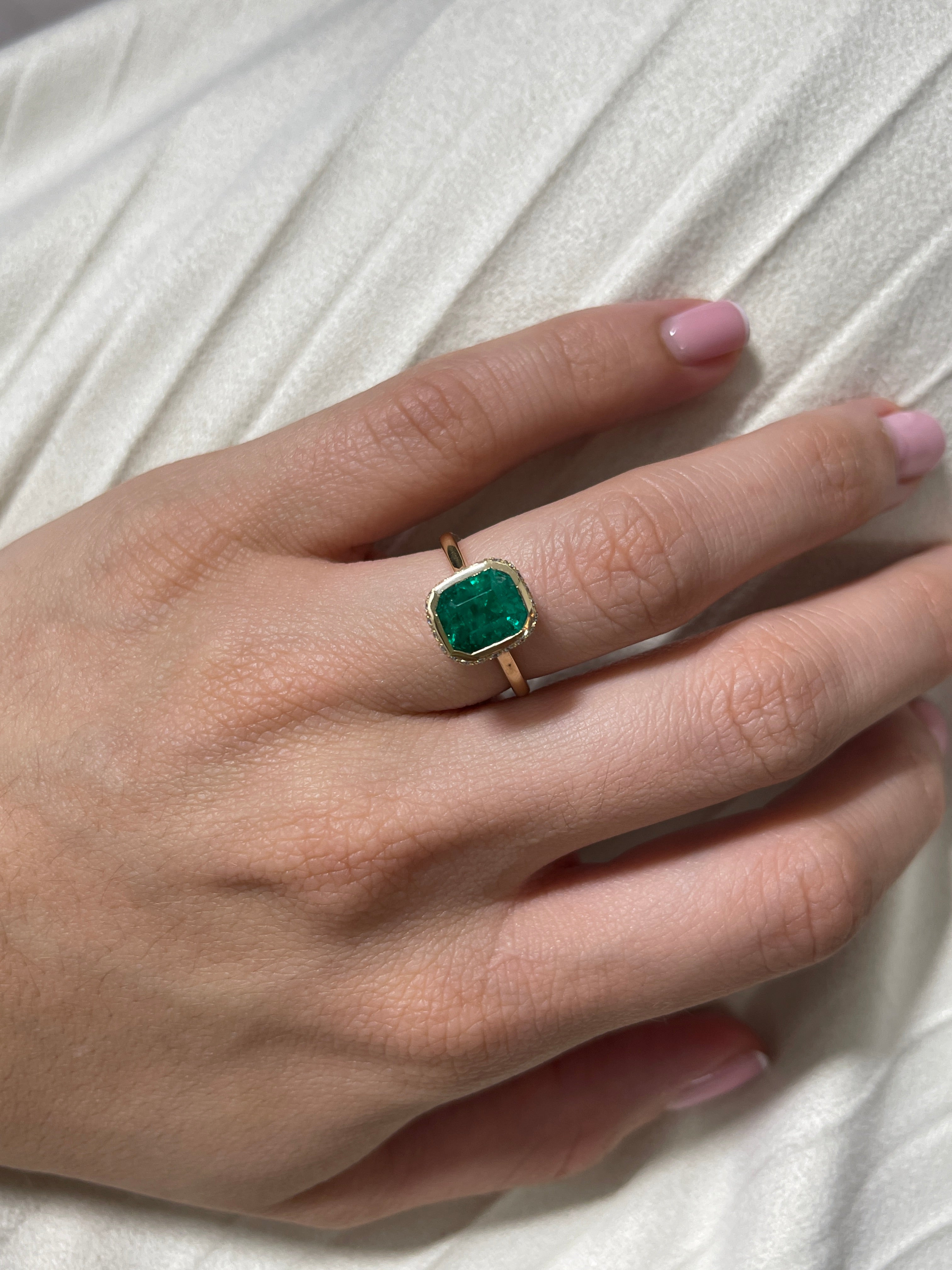 14K Colombian Emerald and diamond pave bezel statement ring with hidden halo, featuring 3.19tcw emeralds and elegant design.
