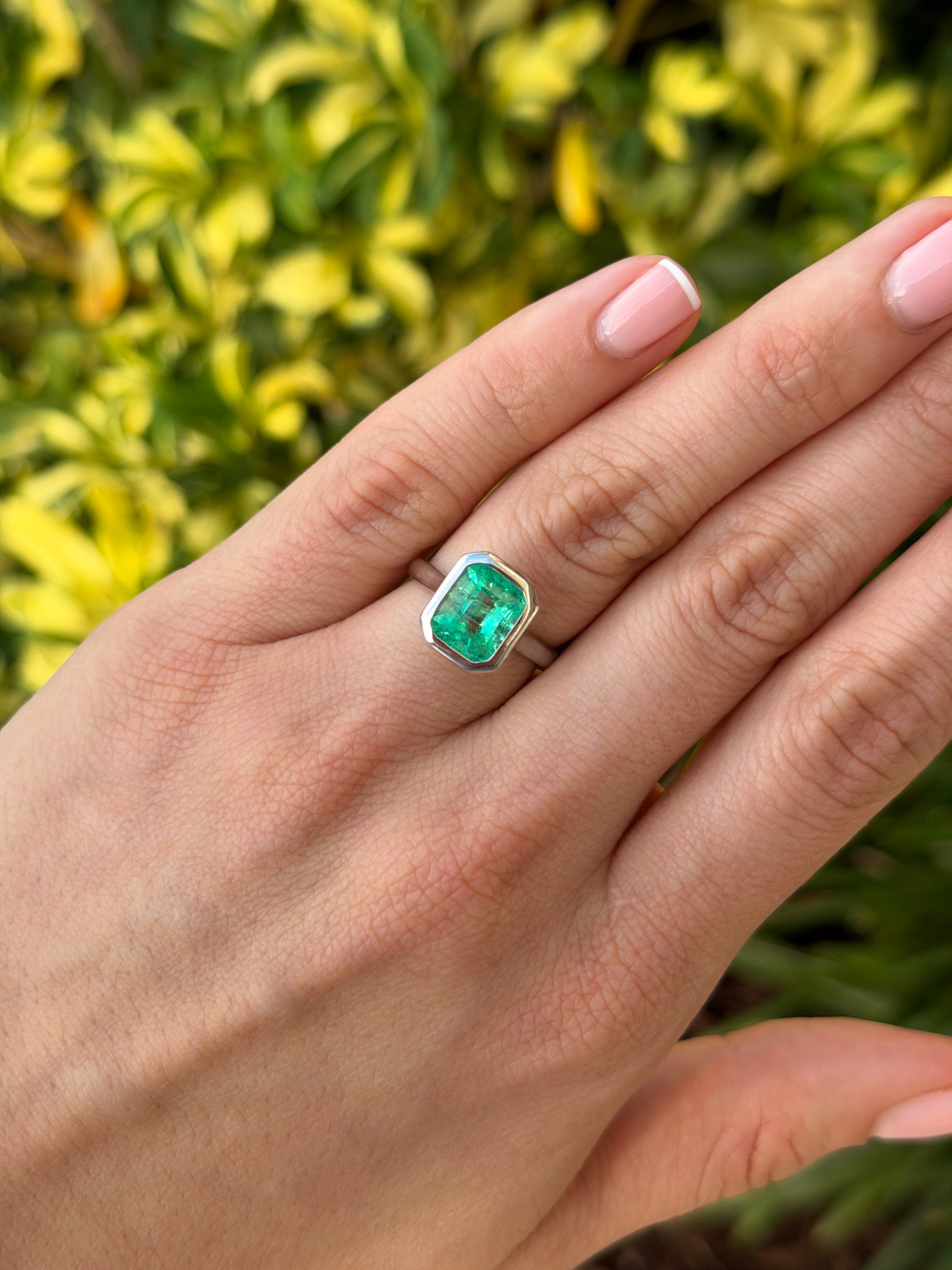 18K white gold ring featuring a 3.46ct Colombian Chivor emerald bezel set as a solitaire, from JR Colombian Emeralds.
