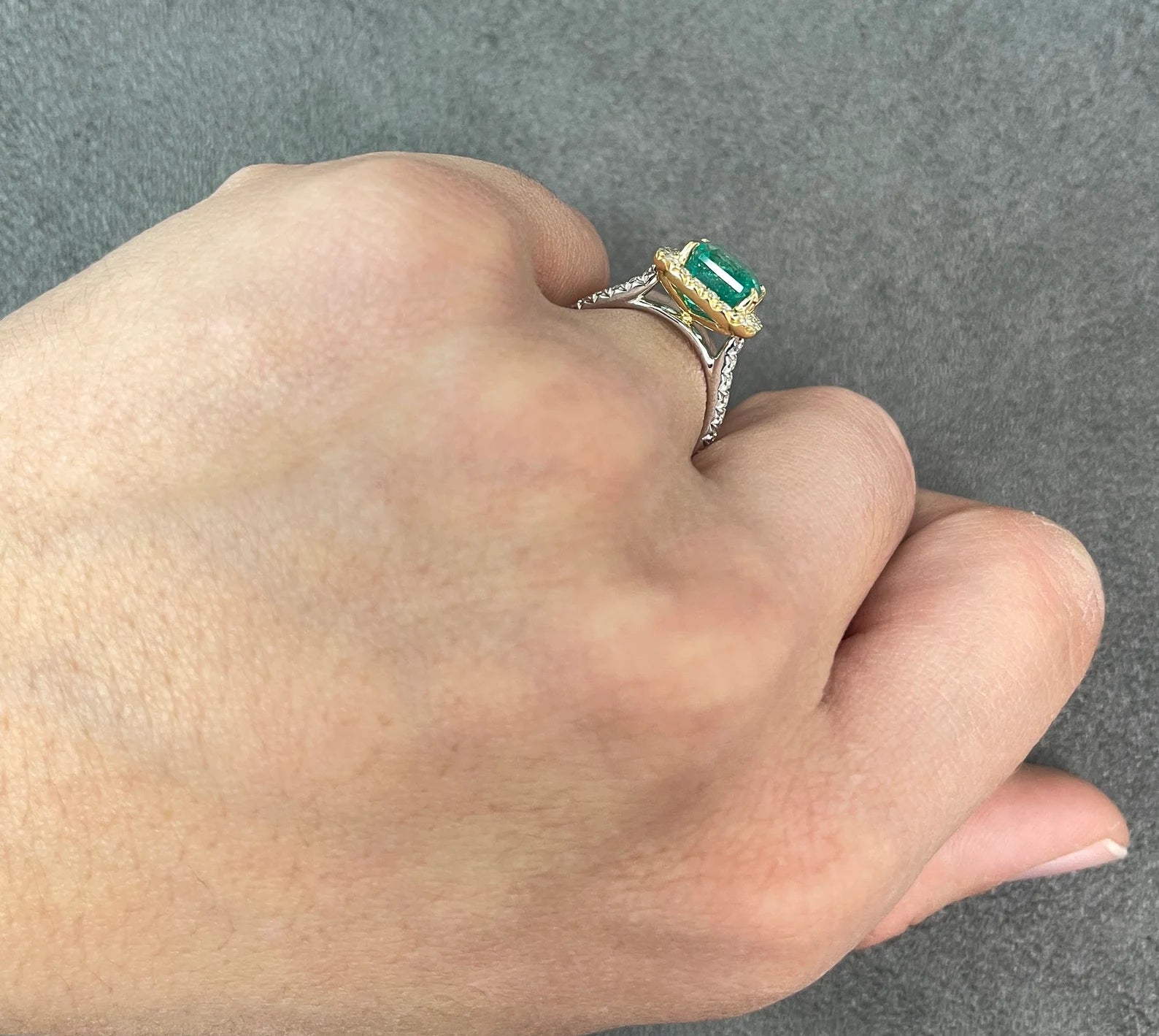 Asscher cut Colombian emerald and diamond halo 18K two-tone ring by JR Colombian Emeralds, showcasing vibrant gemstones and elegant design.