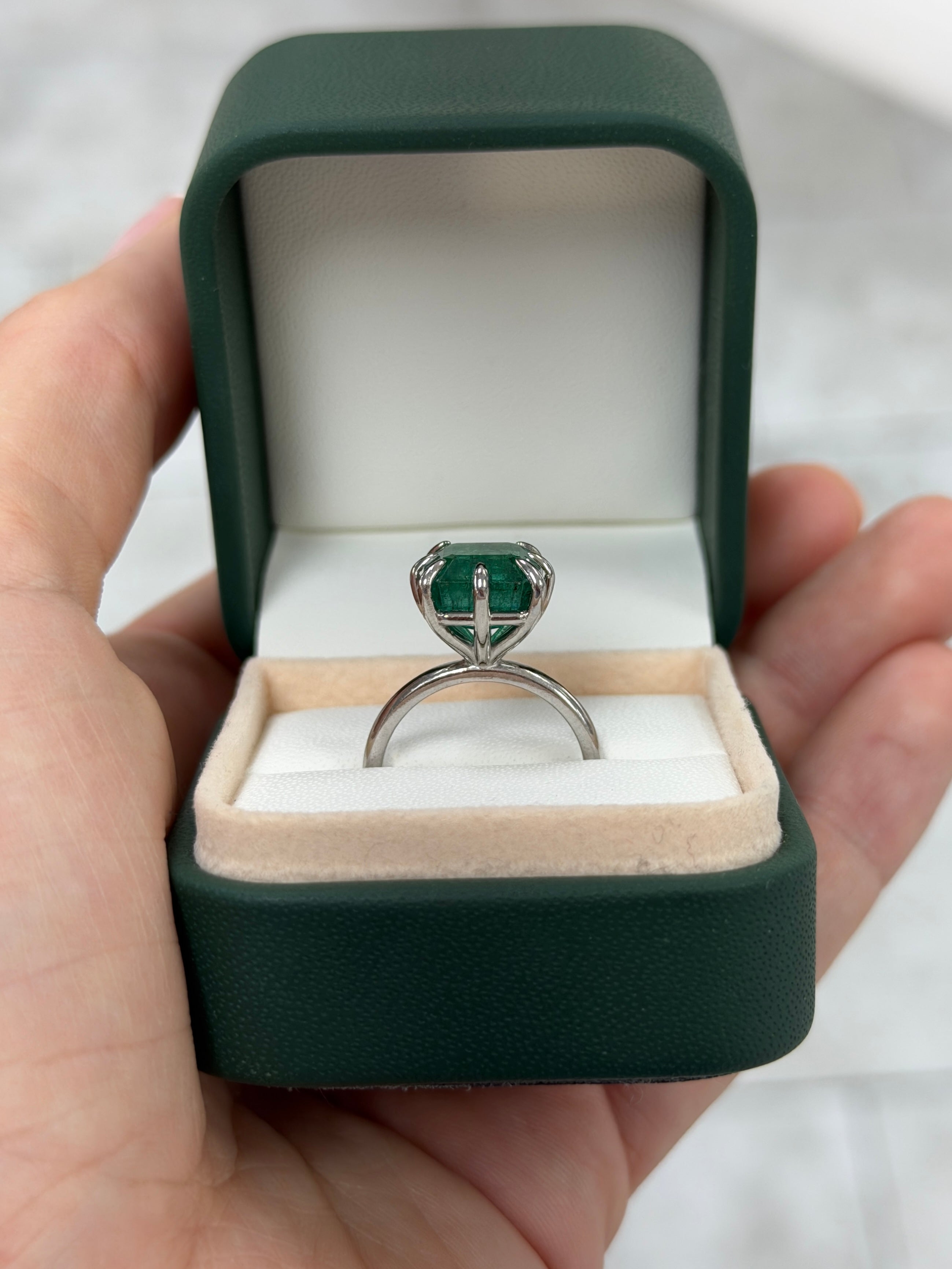 14K white gold ring with a 5.84 carat asscher cut diamond solitaire, featuring a multi-prong setting by JR Colombian Emeralds.