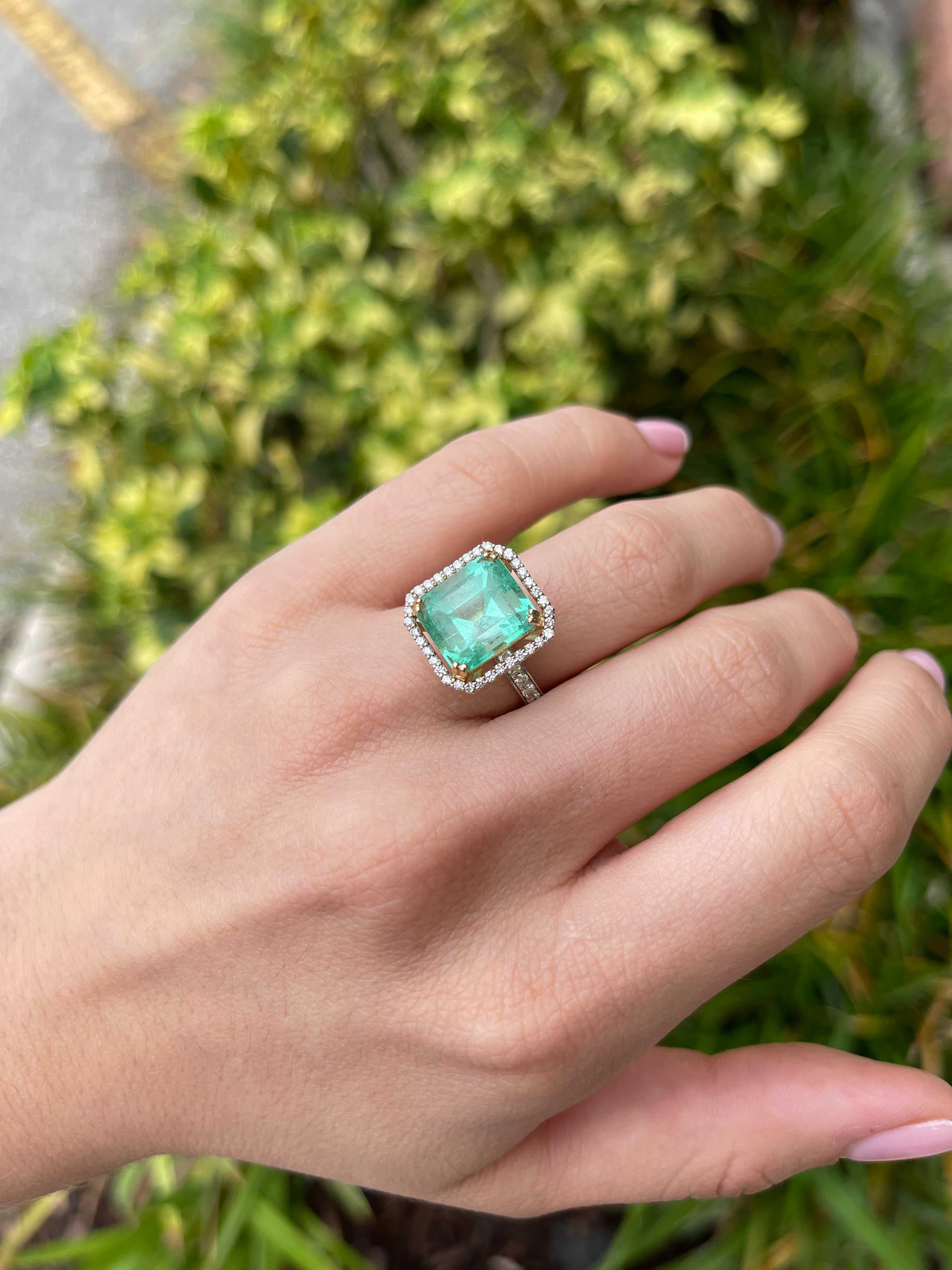 Large Colombian emerald Asscher cut center stone with diamond halo on 18K gold engagement ring by JR Colombian Emeralds.