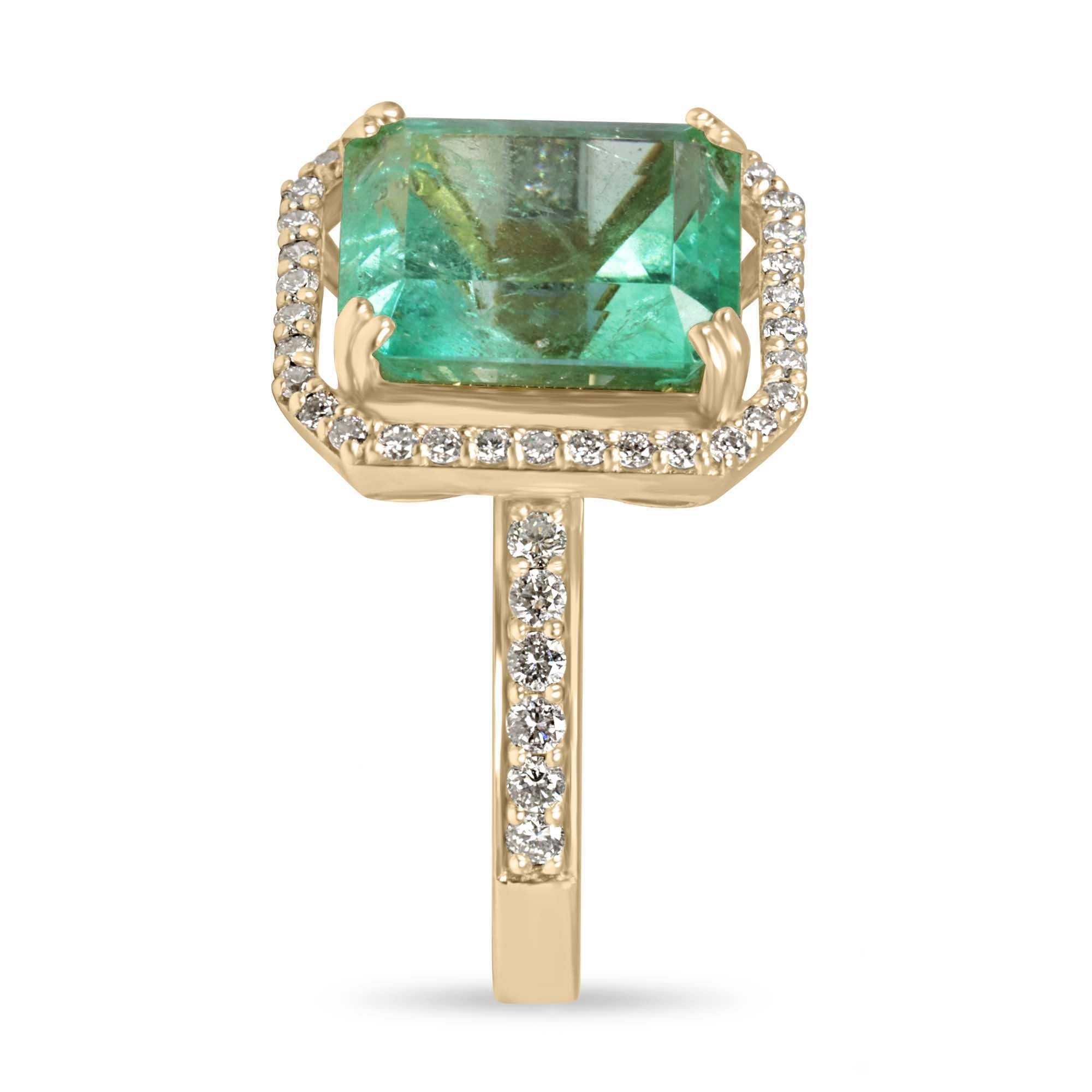 Large Colombian emerald Asscher cut engagement ring with diamond halo, 18K gold, from JR Colombian Emeralds.
