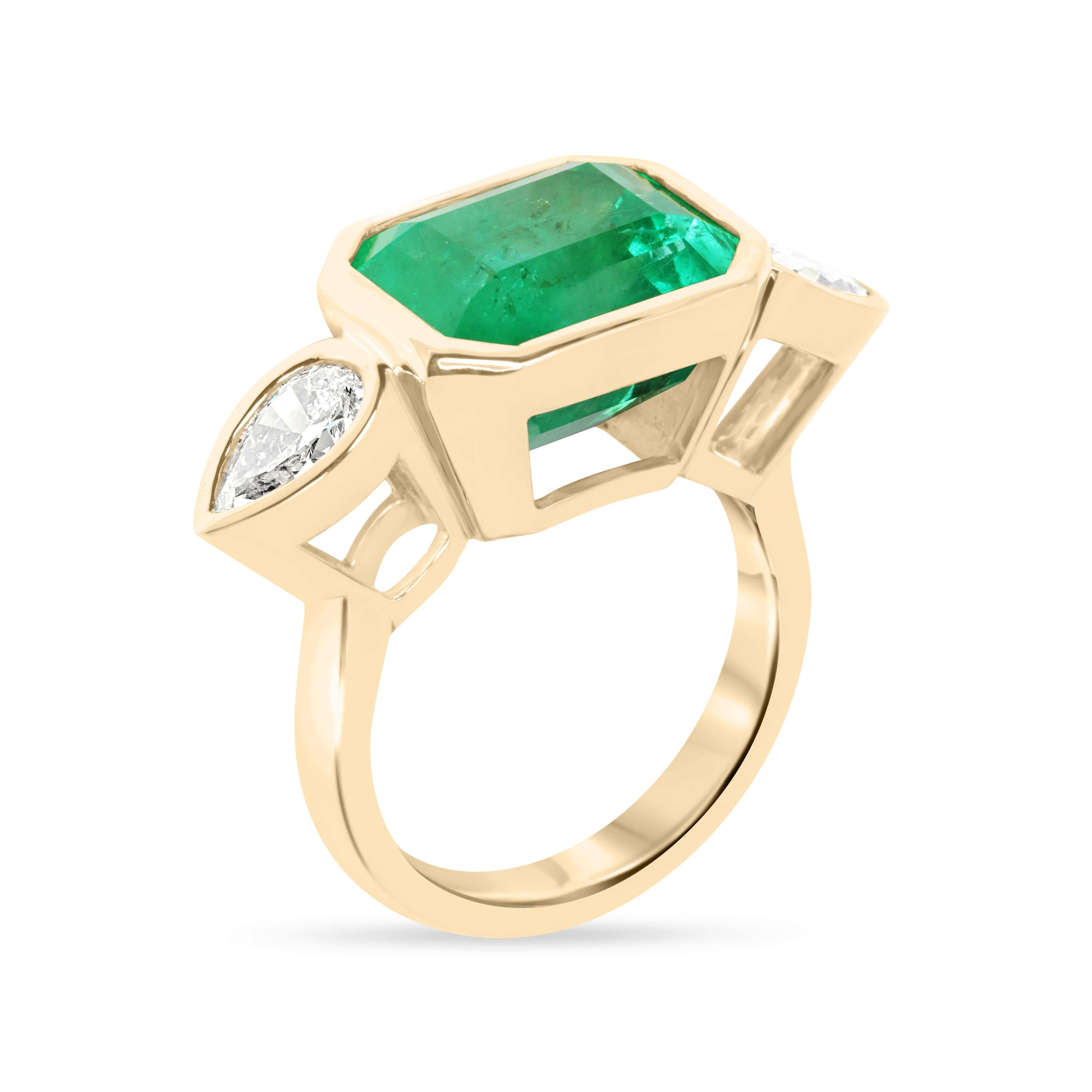 East to West Colombian emerald and pear diamond three-stone ring in 18K gold by JR Colombian Emeralds.