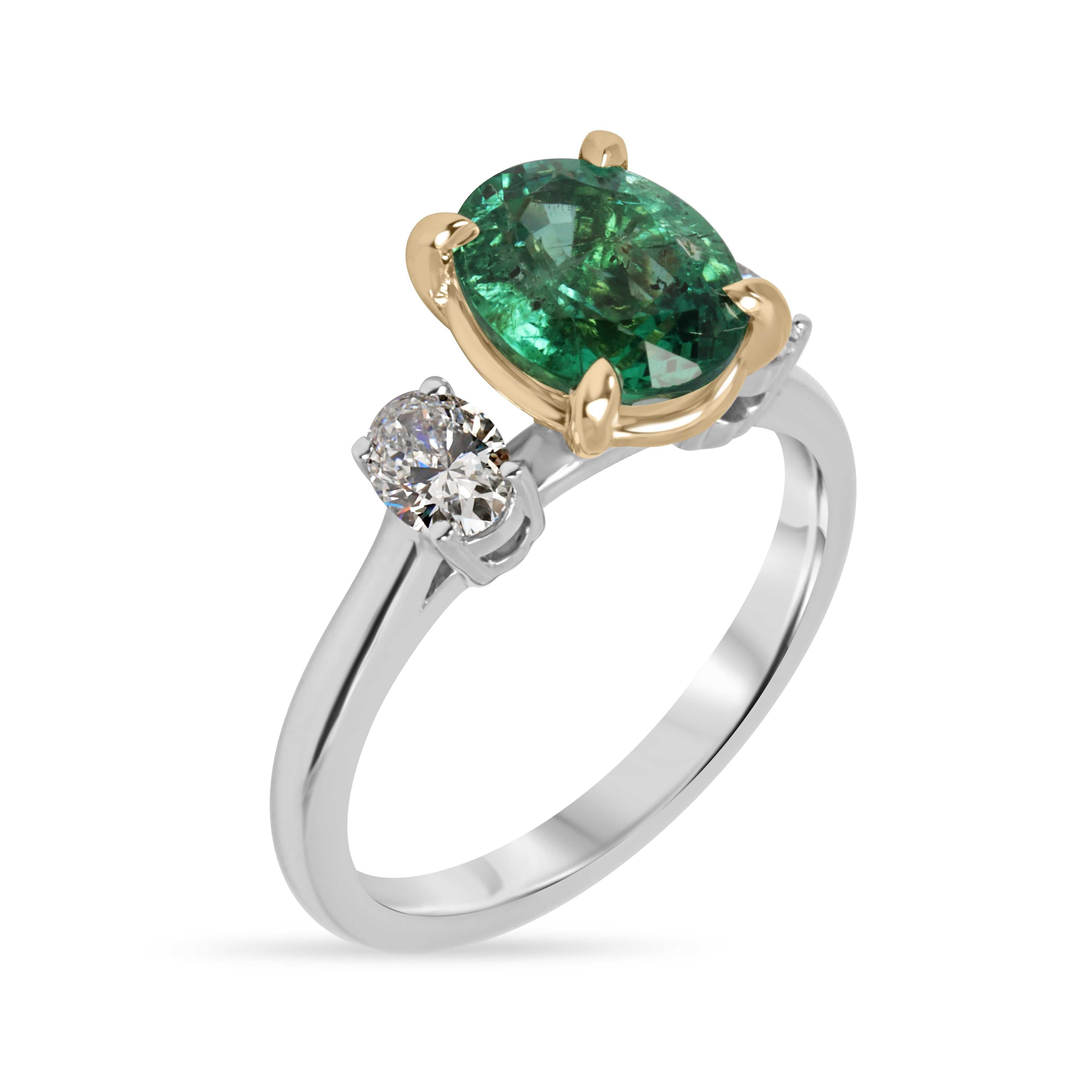 JR Colombian Emeralds 2.19tcw oval emerald and lab diamond three-stone engagement ring in platinum with 14K accents, detailed gemstone setting.
