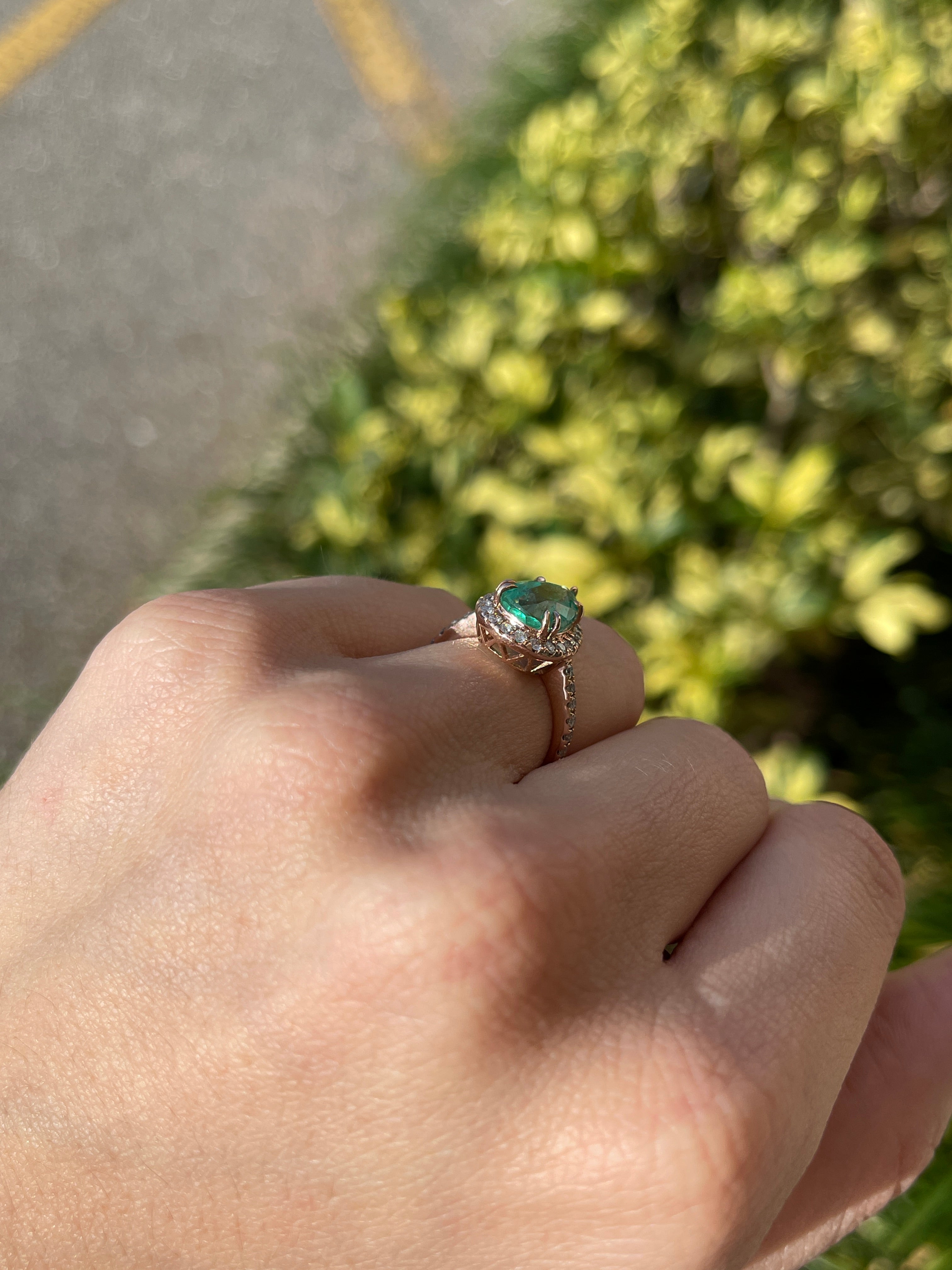14K rose gold engagement ring with 3.44tcw pear-shaped emerald and diamond halo and shank by JR Colombian Emeralds.