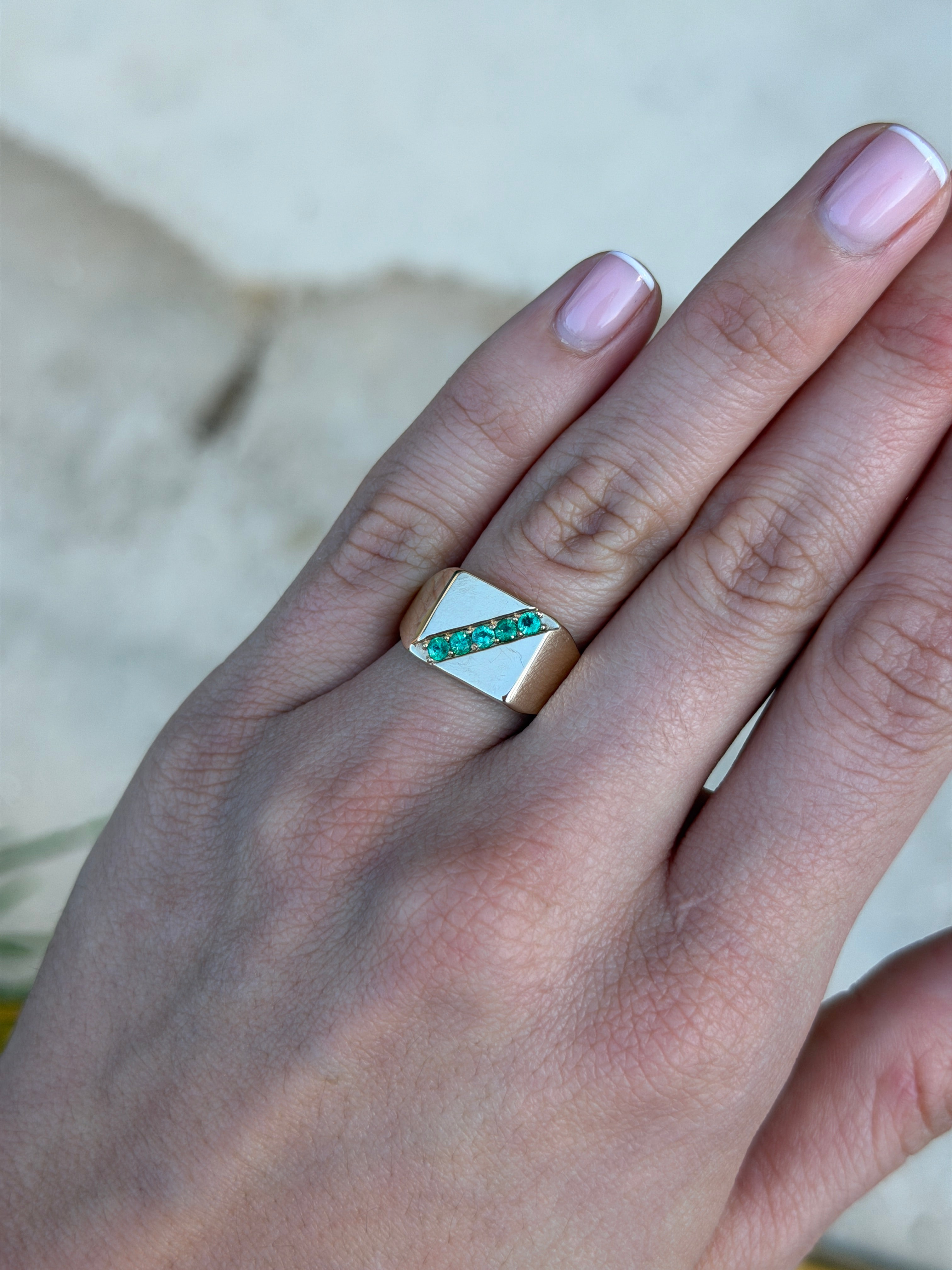 14K yellow gold men's signet ring with round emeralds and channel setting, featuring a 0.35 carat total weight from JR Colombian Emeralds.