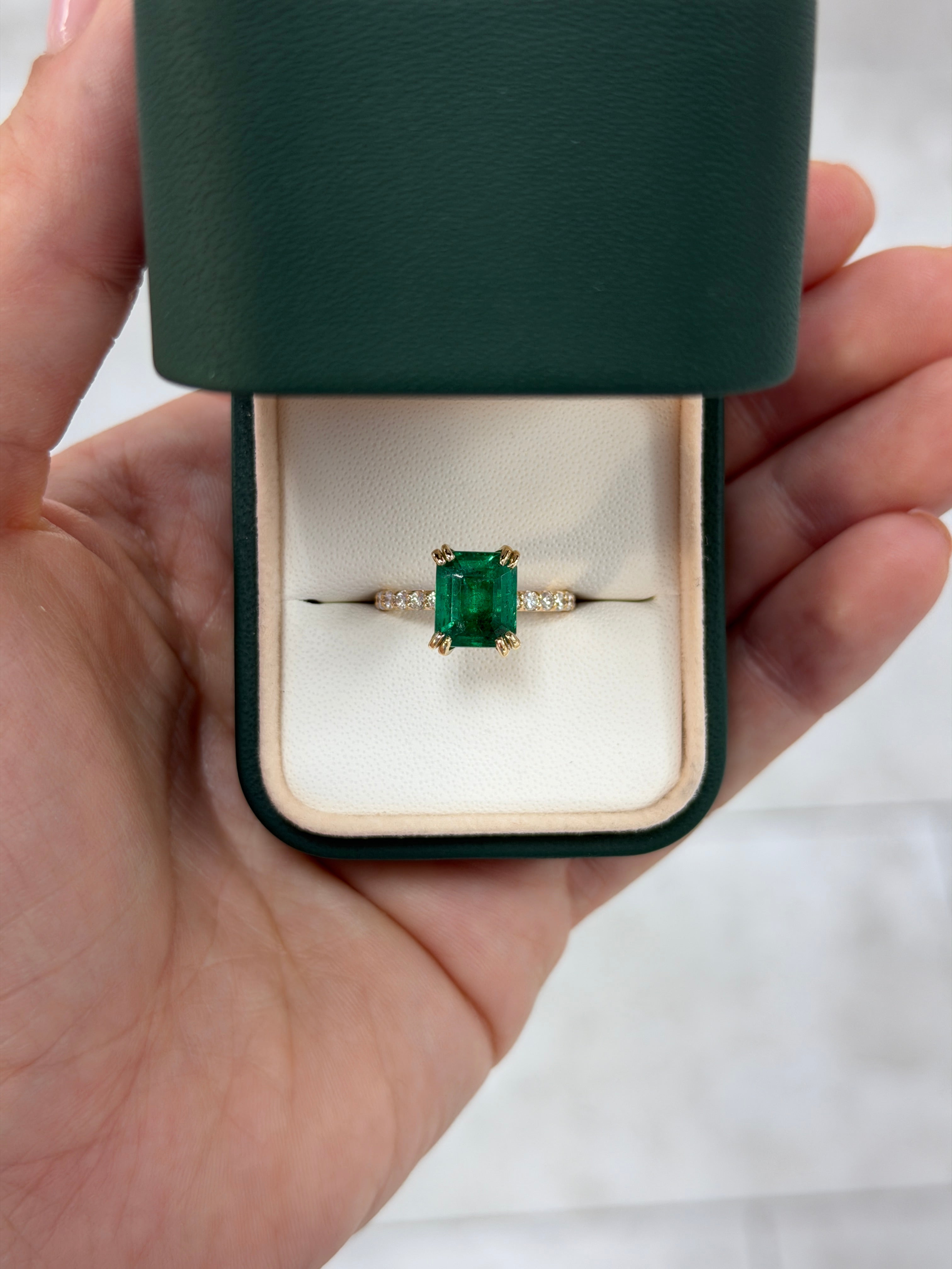 14K emerald solitaire engagement ring with double prong setting and diamond accents by JR Colombian Emeralds