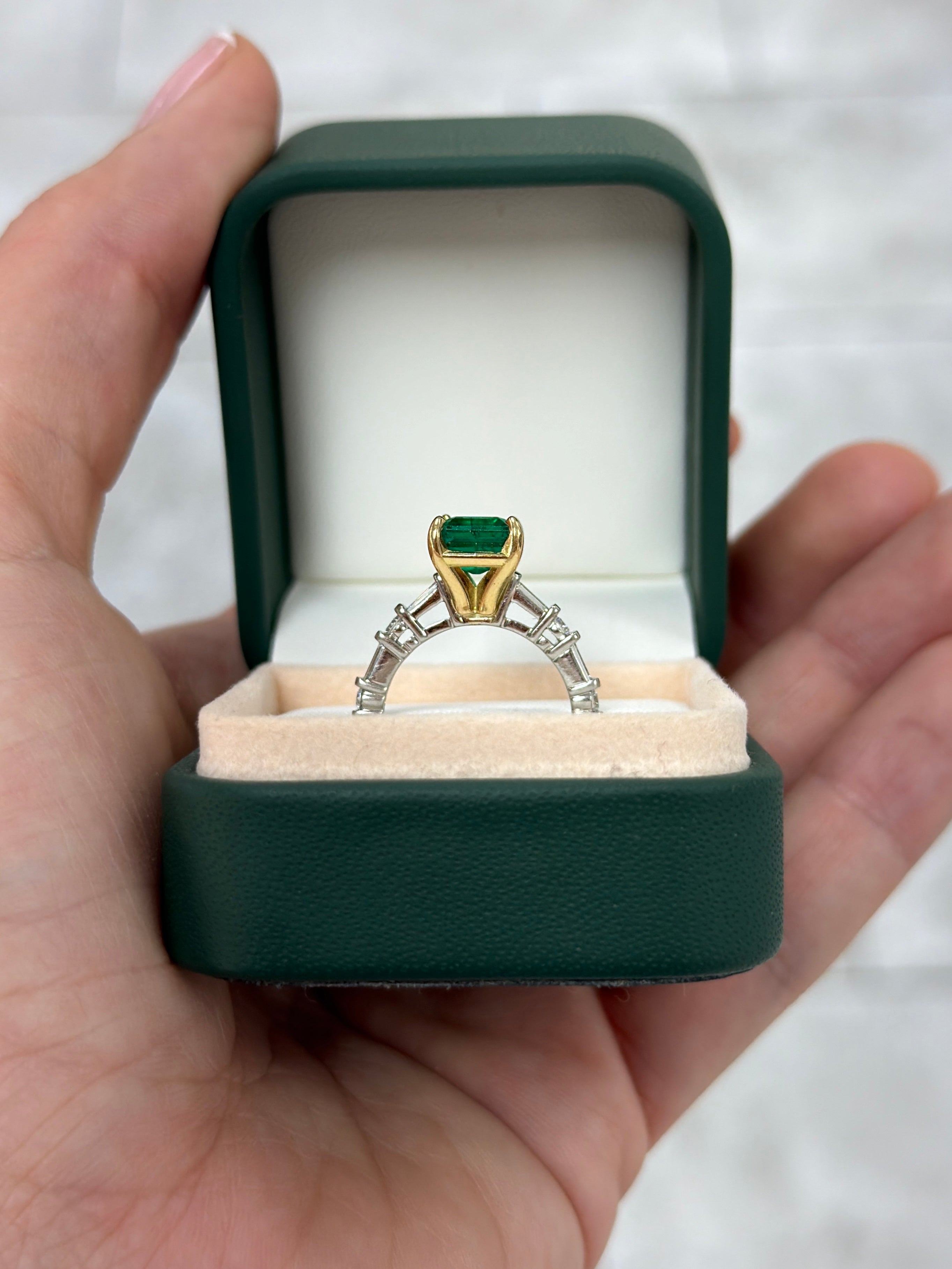 18K gold engagement ring with 3.55tcw vivid natural emerald and platinum diamond baguette accents, from JR Colombian Emeralds.