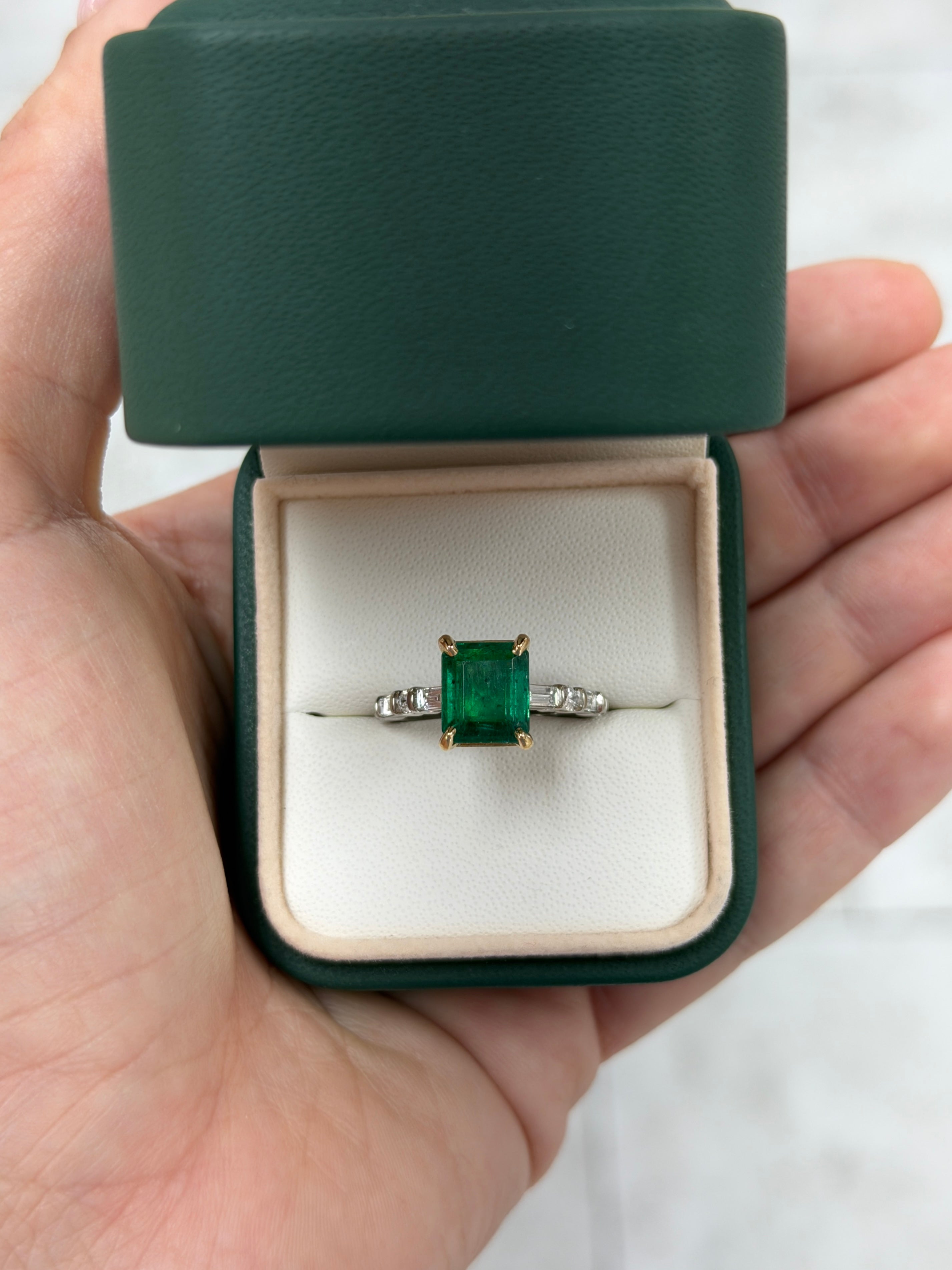 18K gold engagement ring with 3.55 carats of vivid natural emeralds and platinum diamond baguette accents by JR Colombian Emeralds