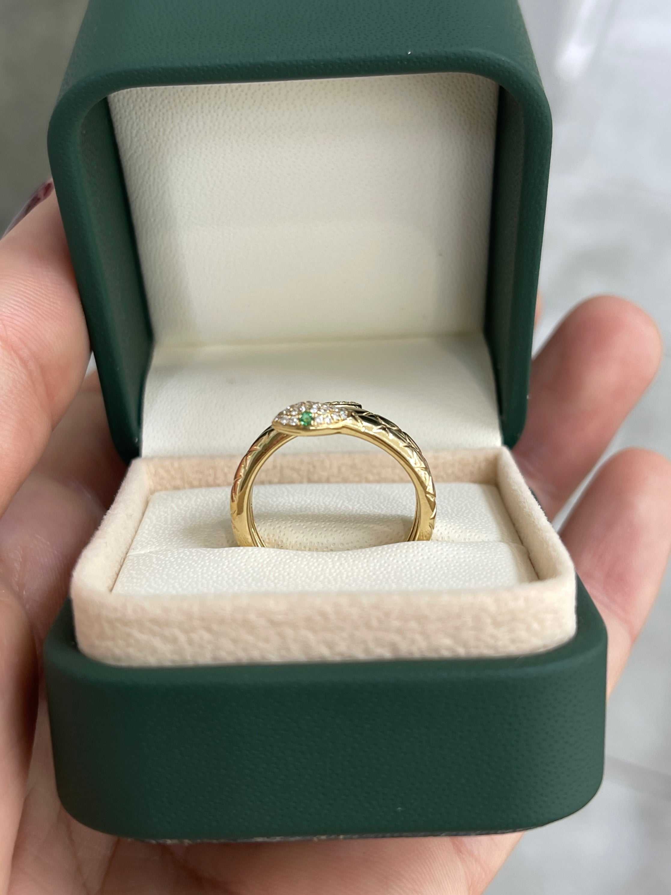 14K gold snake ring with 0.05tcw emerald and diamond accents, featuring a detailed design from JR Colombian Emeralds.